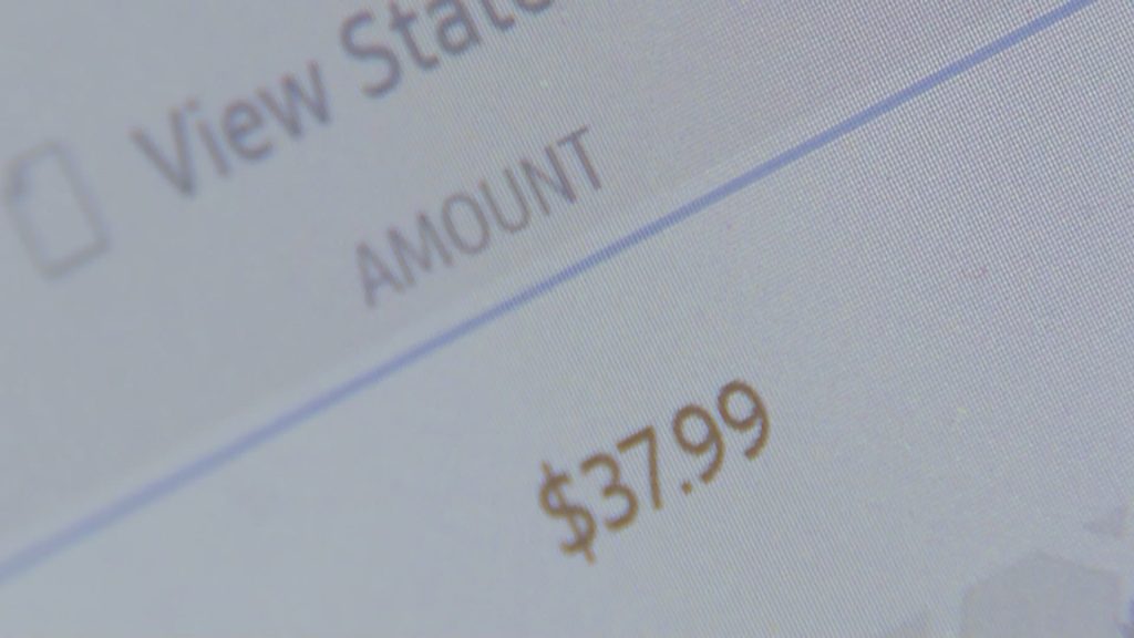 Grant Larmier saw another charge hit his account even after getting a new credit card. (Photo: KSL TV)