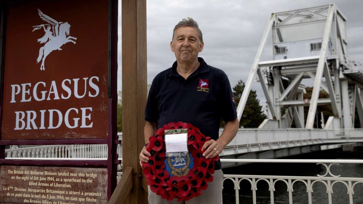 One man lays wreaths in Normandy on this unusual D-Day
