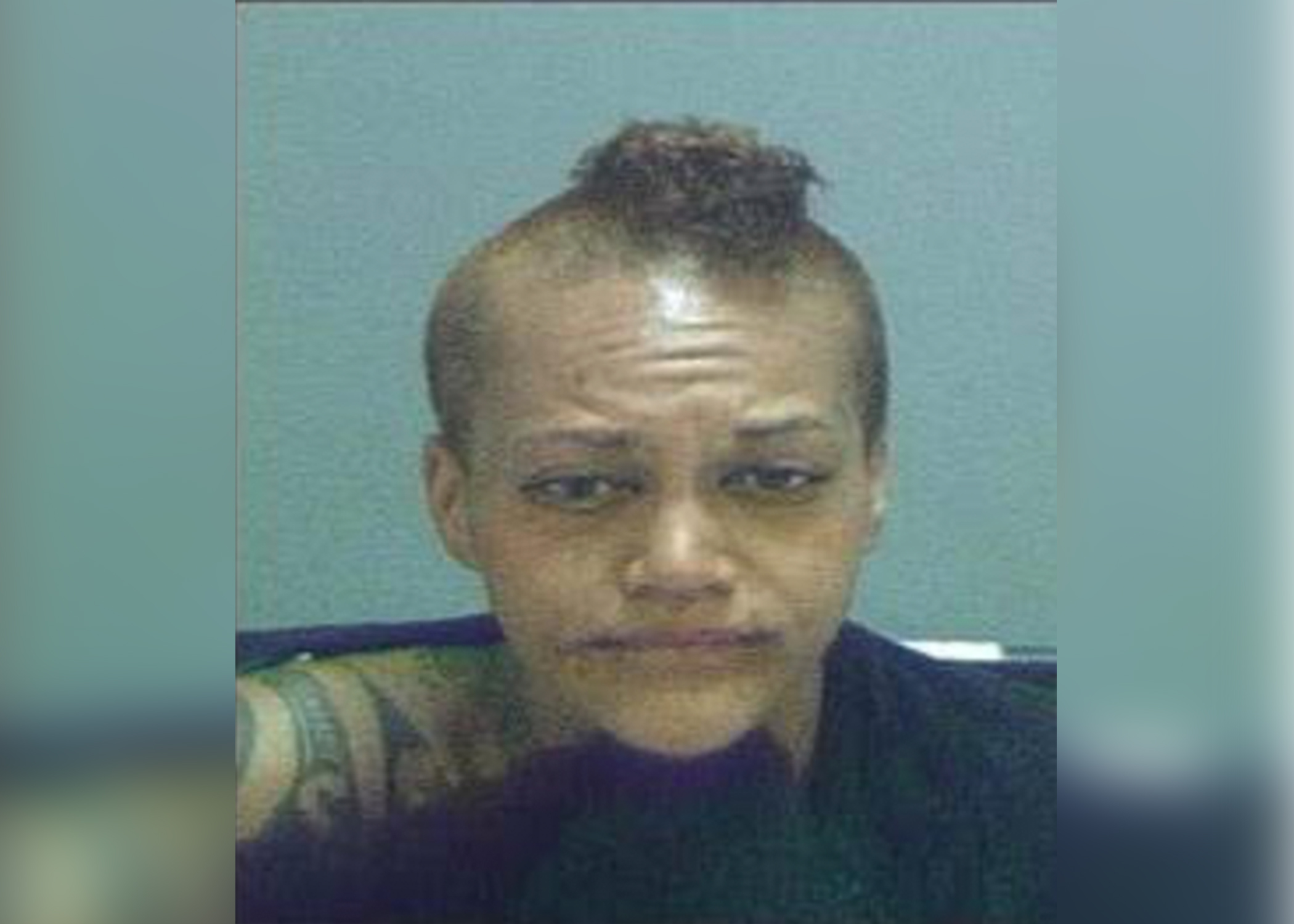 Police arrest woman accused of urinating on overturned Salt Lake patrol car during riot