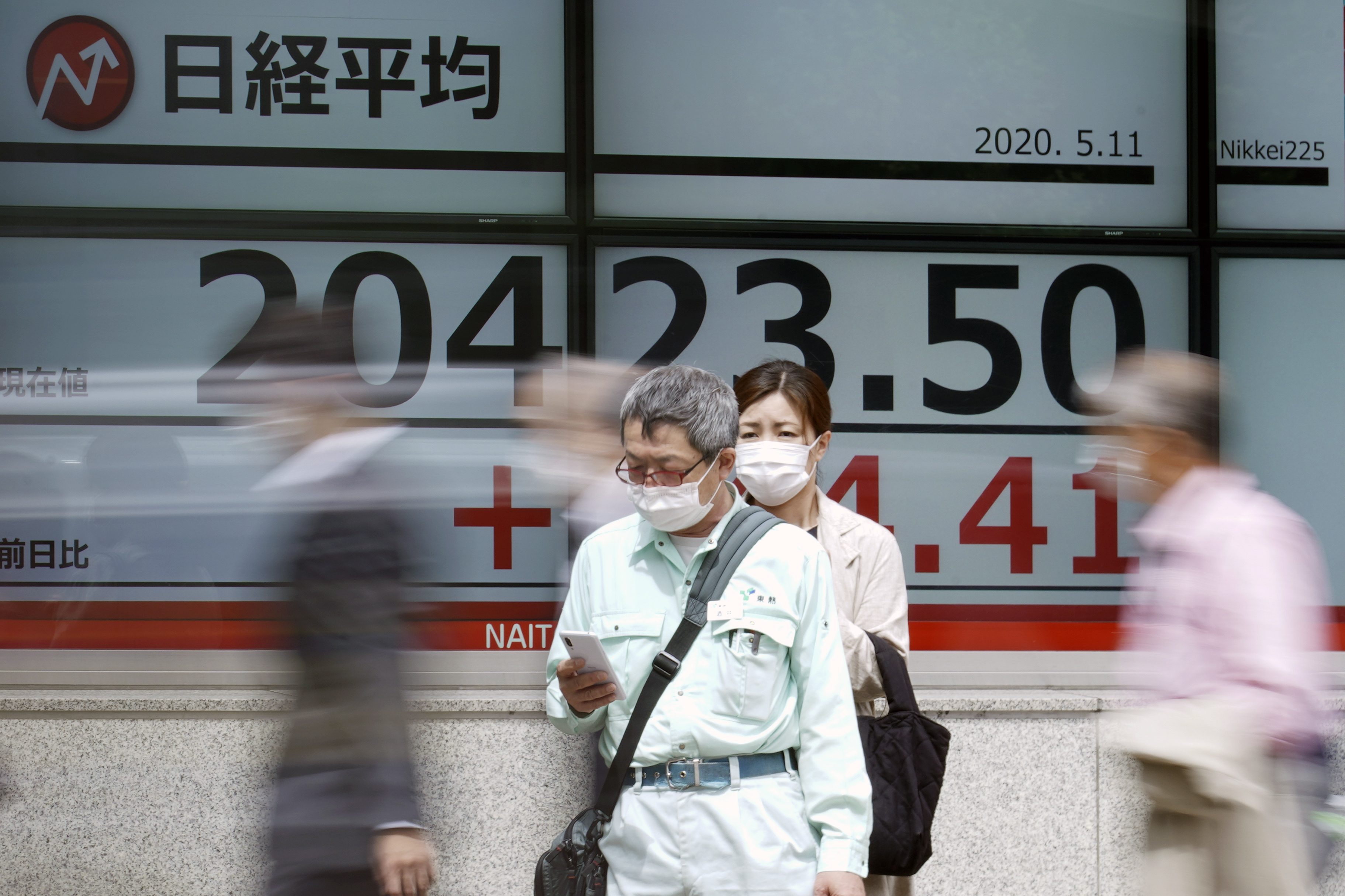 Stocks vault higher, as Nasdaq hits record on economy hopes