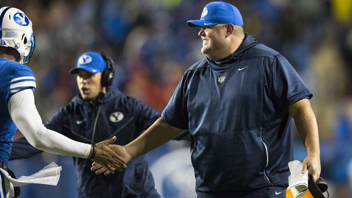 BYU offensive line coach Eric Mateos on the sidelines during BYU’s win over nationally ranked Boise State on Oct. 19, 2019 (Photo: Madeline Mortensen/BYU Photo)