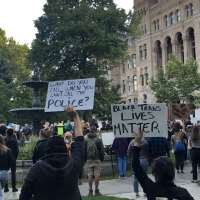 Urged to get out and vote, 1K protesters eschew marching after early morning Black Lives Matter gathering