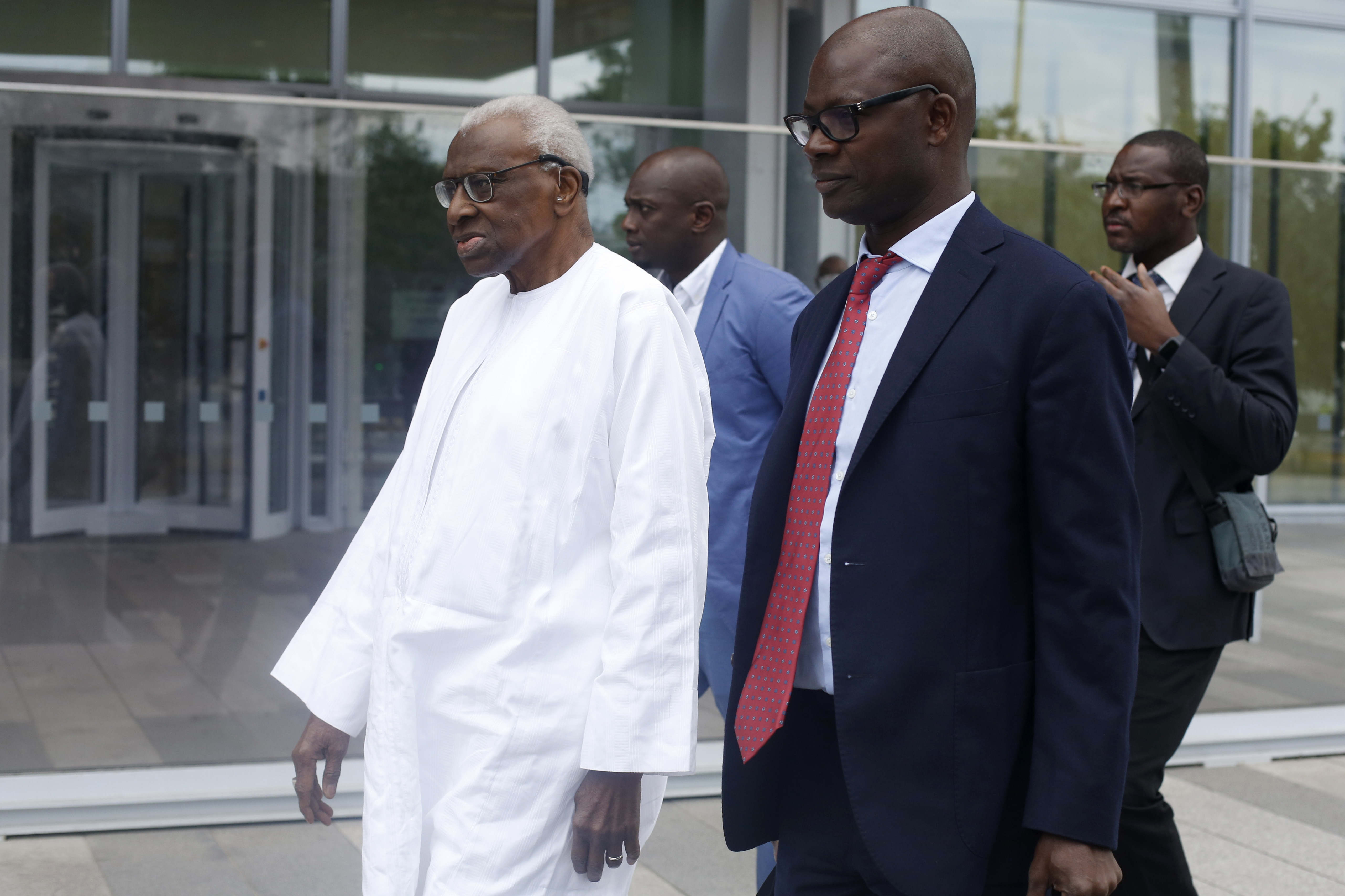 Former IAAF president turns on son at corruption trial