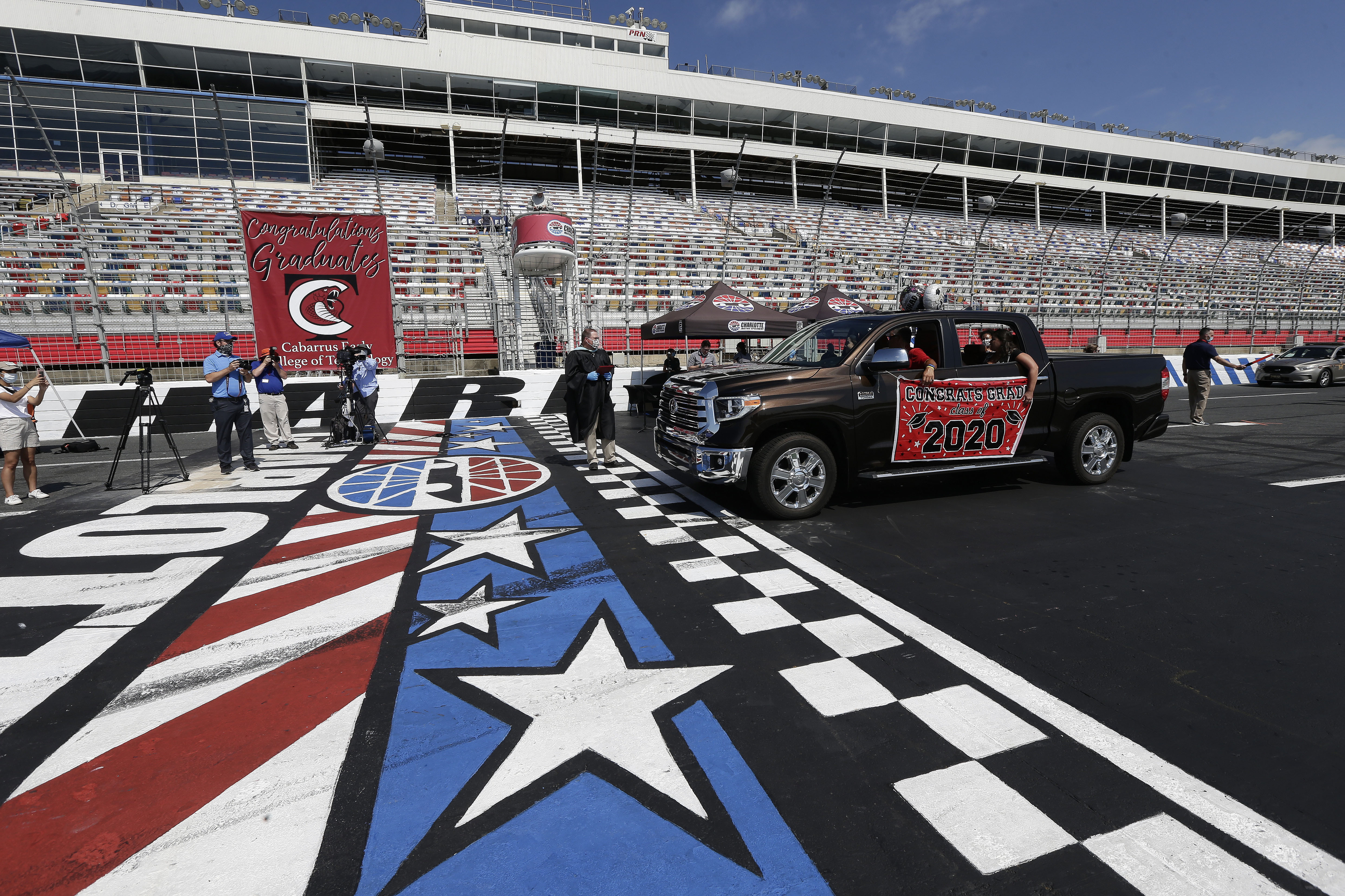 Thousands collect diplomas at North Carolina NASCAR track