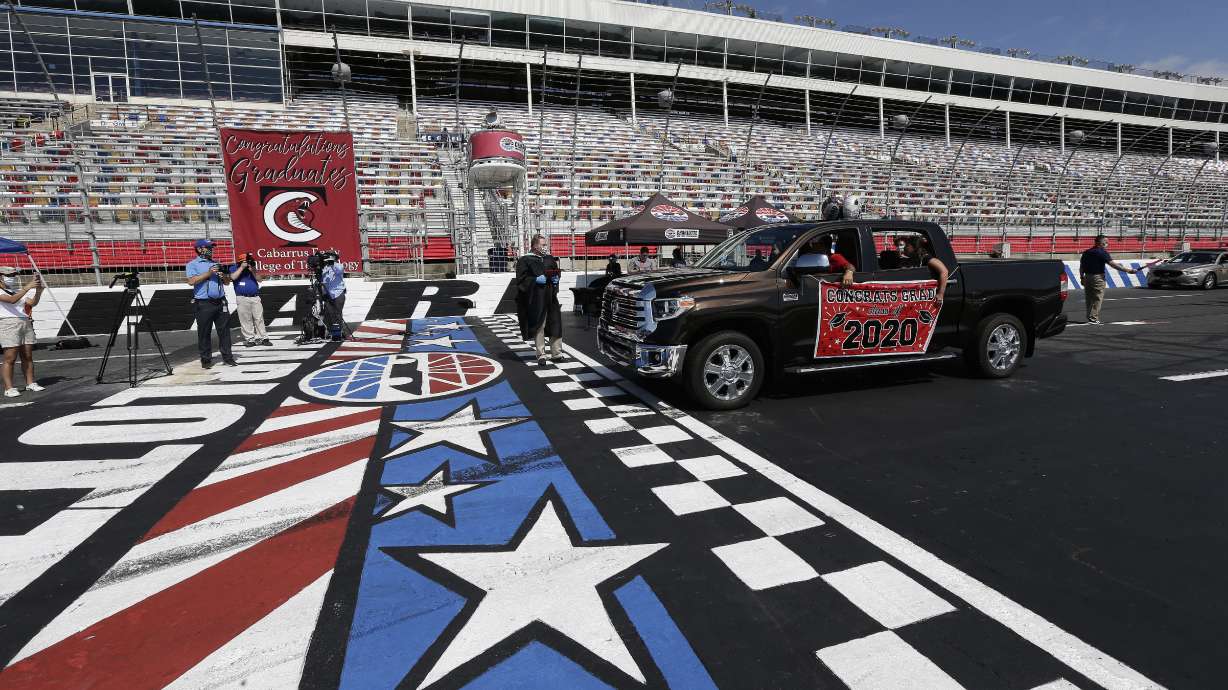 Thousands collect diplomas at North Carolina NASCAR track