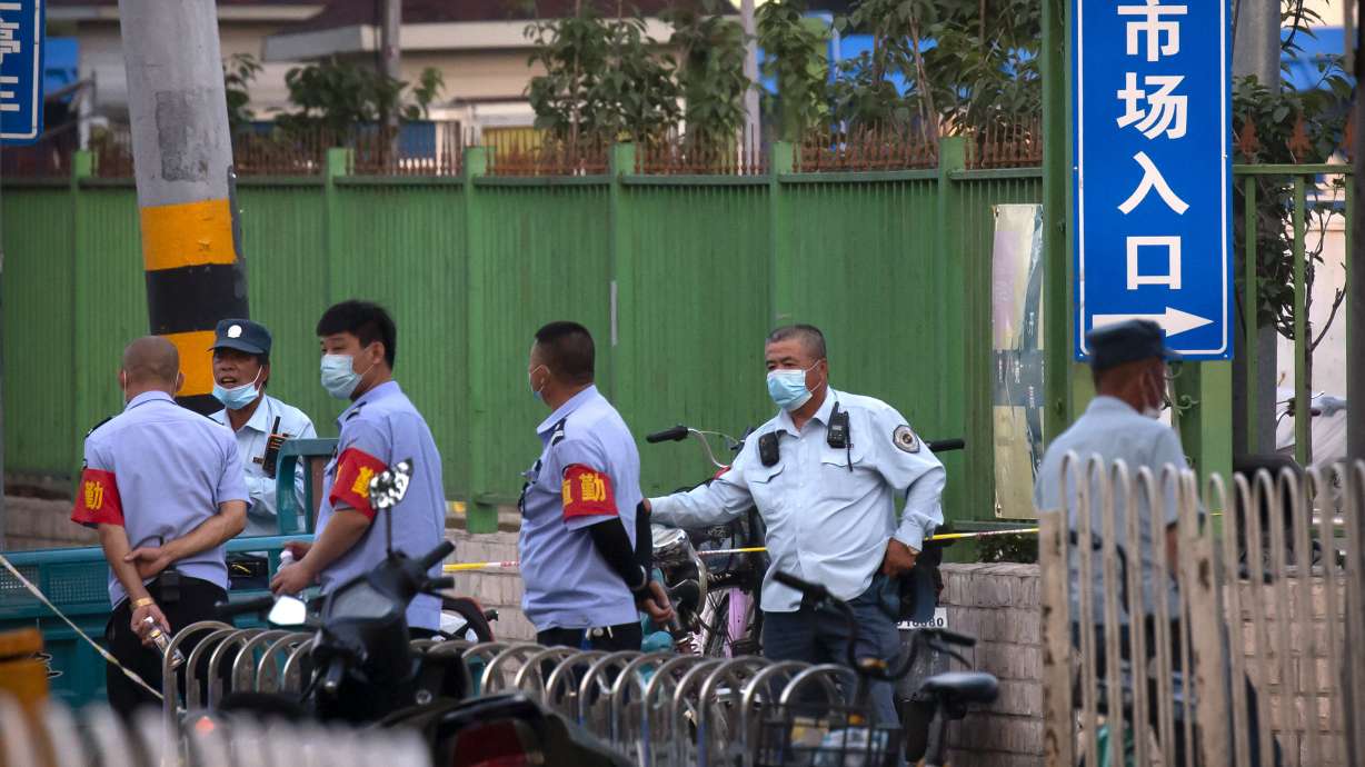 The Latest: China has most new virus cases since mid-April