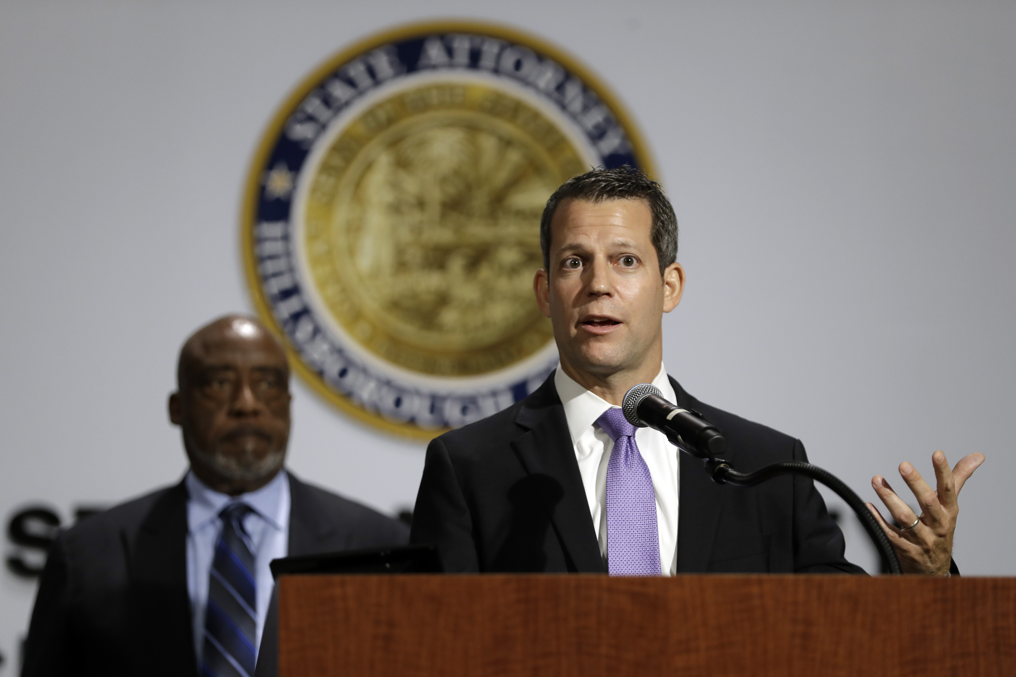 The Latest: Man shot during protest over New Mexico statue