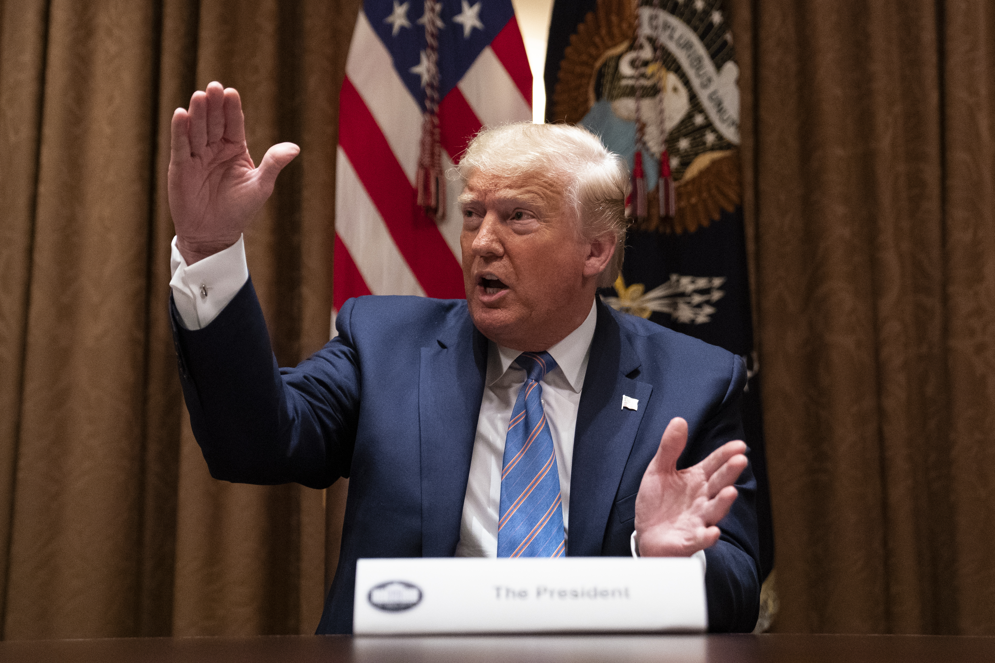 The Latest: Portland reporters injured by police at protests