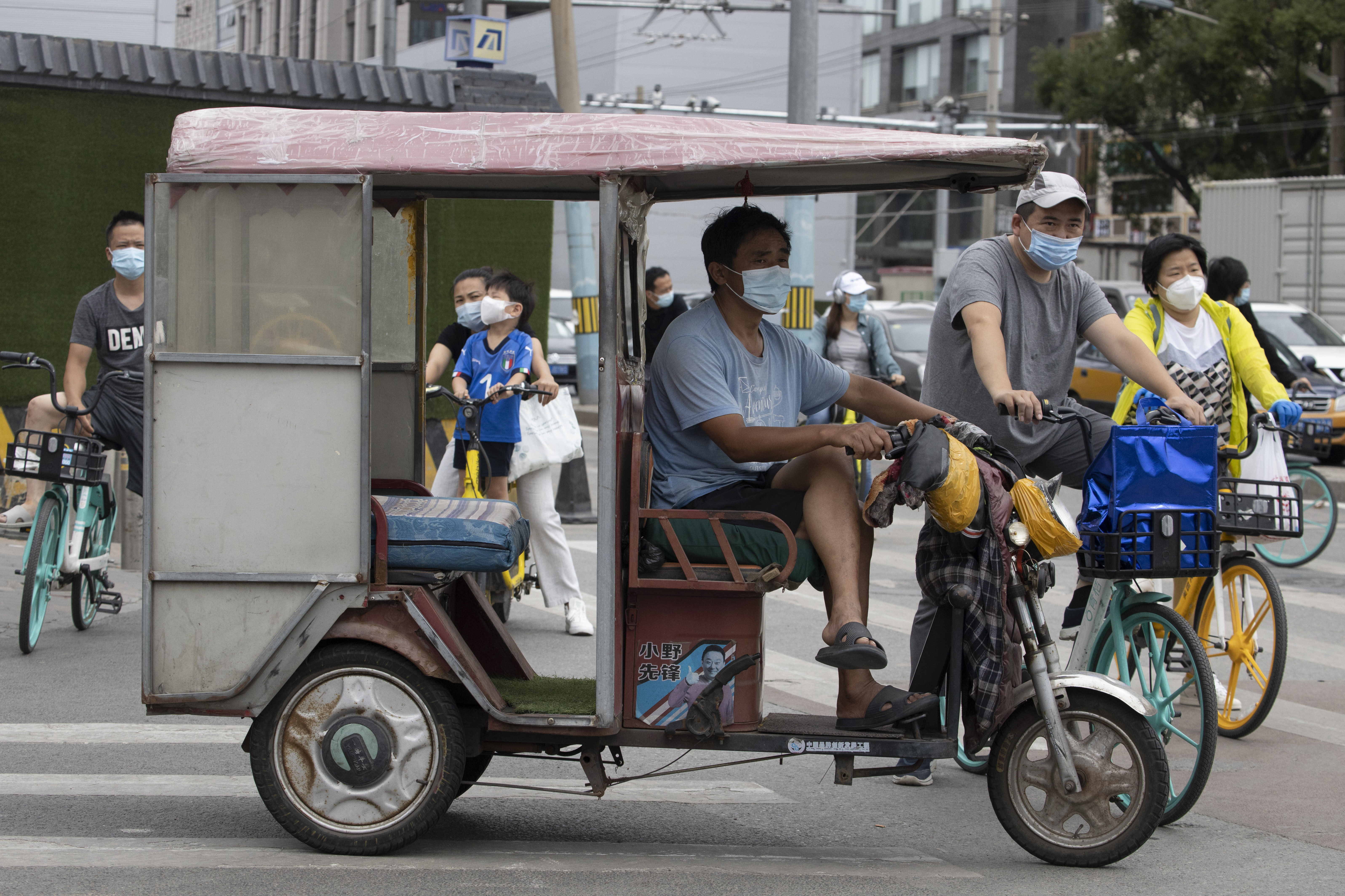 Asia Today: Beijing's daily cases drop, India's rise sharply