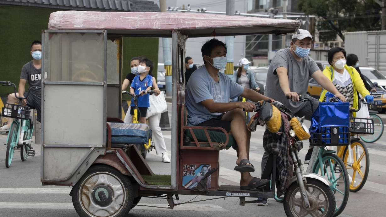 Asia Today: Beijing's daily cases drop, India's rise sharply