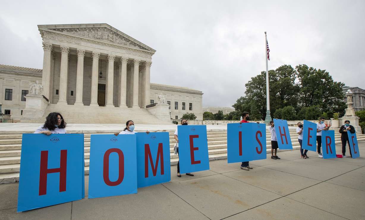 Deferred Action for Childhood Arrivals (DACA) students gather in front of the Supreme Court on Thursday, June 18, 2020, in Washington. (AP Photo/Manuel Balce Ceneta)