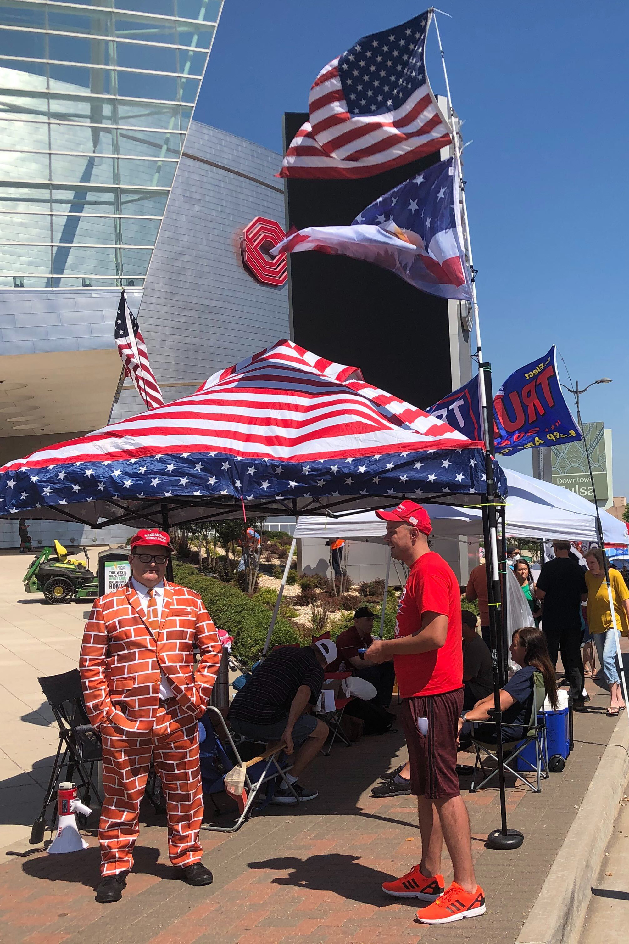 Heat, virus no deterrent for Trump fans camped outside arena