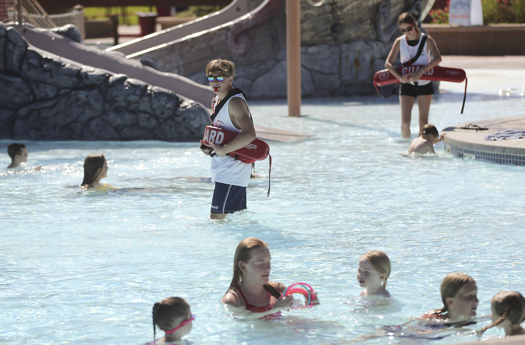 Lifeguard Dexter Gundersen watches swimmers at the Lindon Aquatics Center in Lindon on Tuesday, June 9, 2020. Gundersen was able to find a summer job despite the impacts of the COVID-19 pandemic. (Photo: Jeffrey D Allred, KSL)
