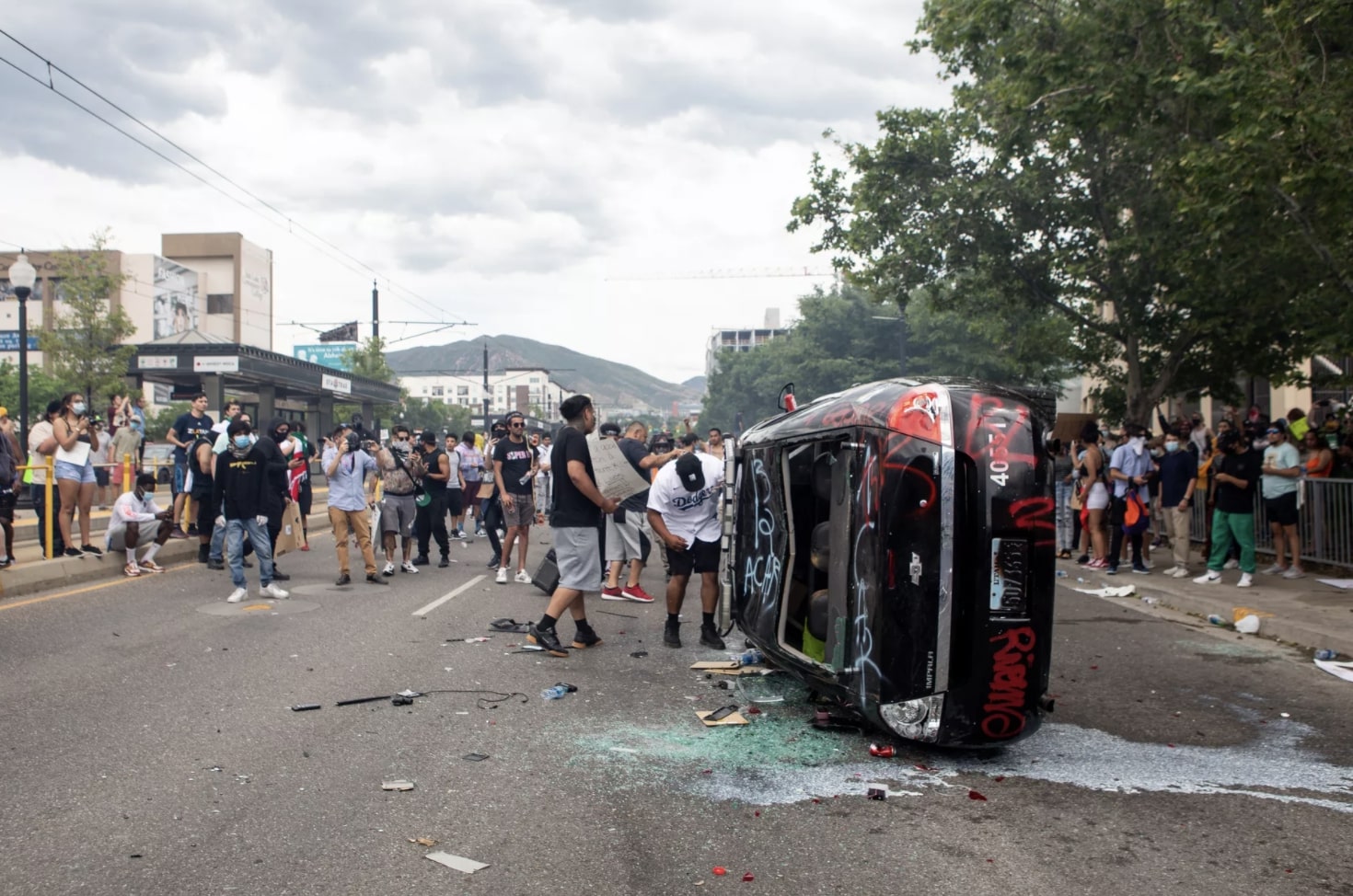 8th and 9th people charged with vandalizing police car during downtown riot