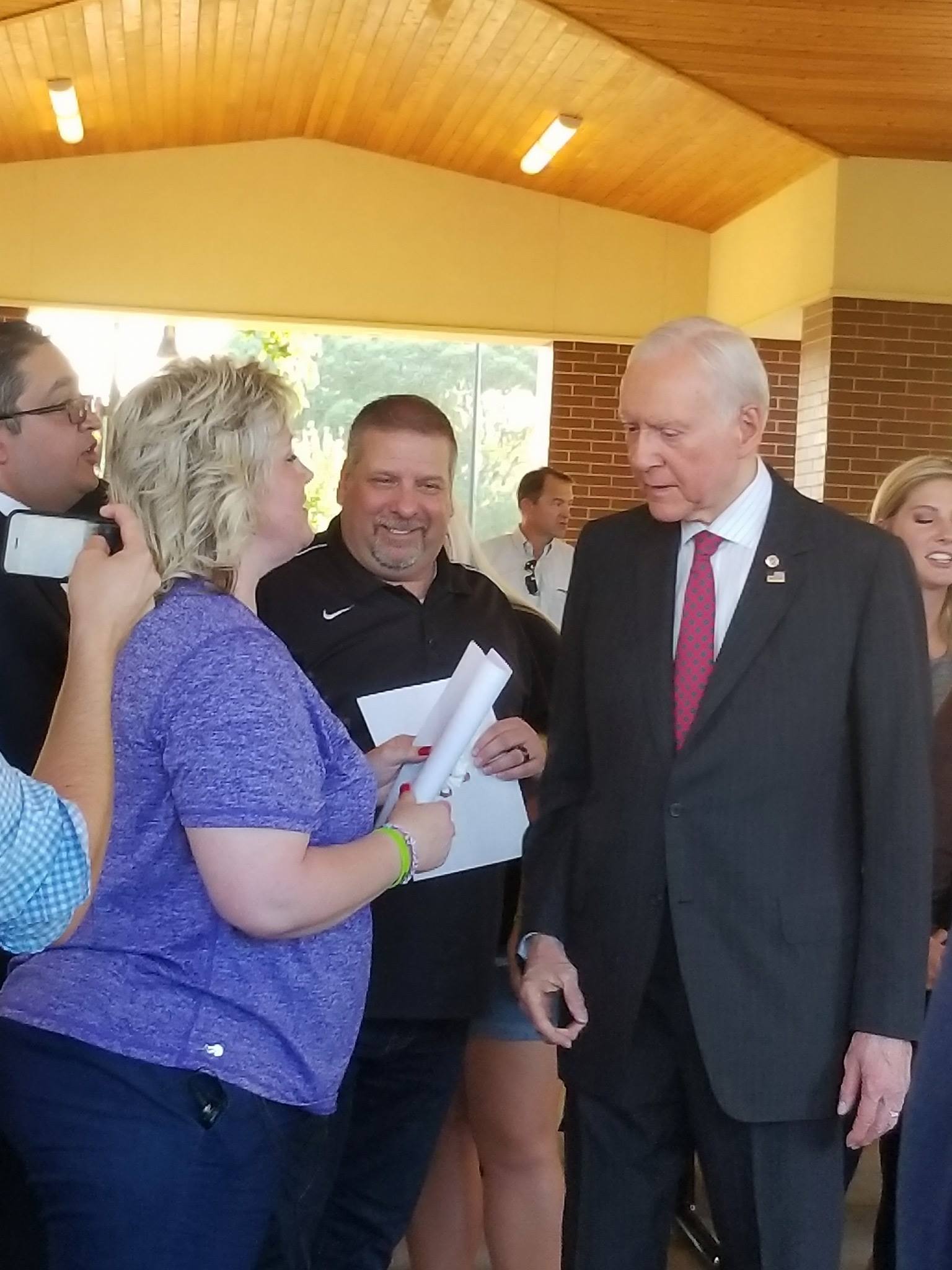 Laurie and Jason Holt talk with now-retired Sen. Orrin Hatch at a news conference and rally for their son in 2016. (Photo: Kim Birdsall /Justice for Josh Facebook page)