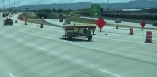 Philip Ely said he was traveling south on I-15 near the 7200 South exit when he watched a boat on a trailer come loose from its towing vehicle. (Photo: Philip Ely via KSL TV)