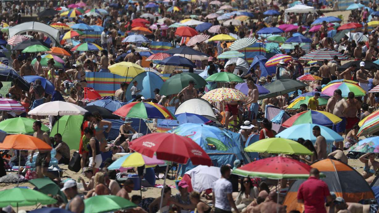 On hottest day of year, thousands cram onto English beaches