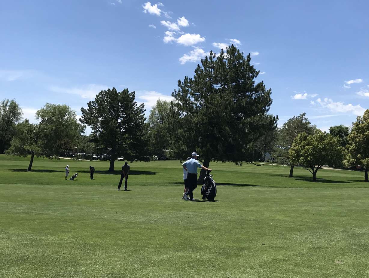Patrick Fishburn sizes up his approach shot on No. 18 during the first round of the Kory Ferry Tour's Utah Championship, Thursday, June 25, 2020 at Oakridge Country Club in Farmington. (Photo: Sean Walker, KSL.com)