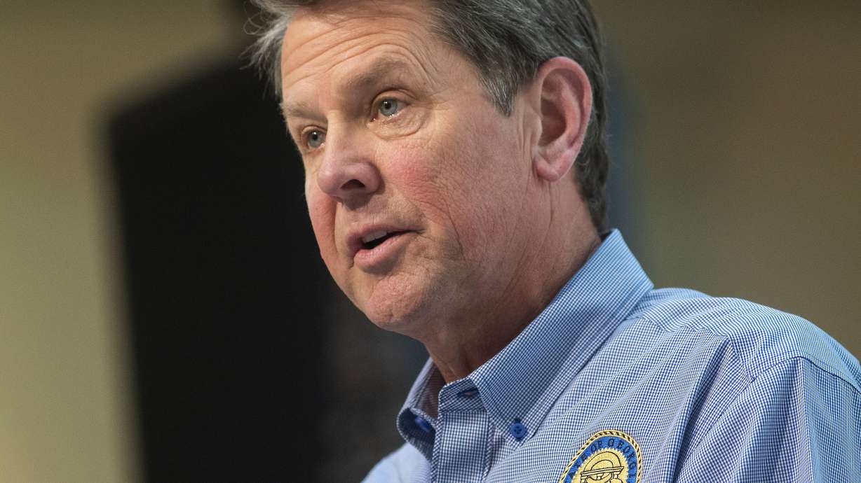 Georgia's Kemp signs hate crimes law after outcry over death