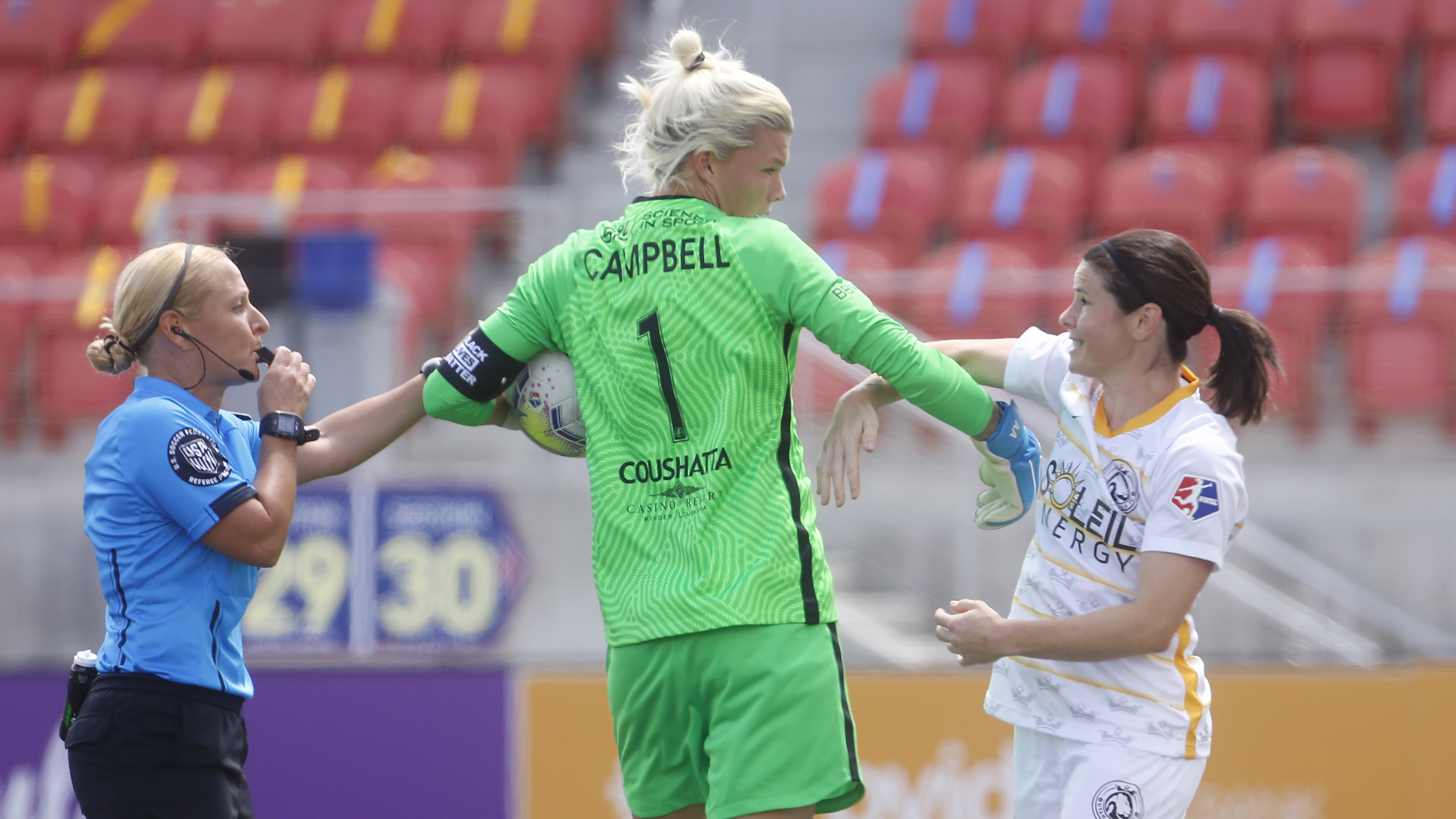 Utah Royals FC midfielder Diana Matheson, right, is separated from Houston Dash goalkeeper Jane Campbell (1) during the second half of an NWSL Challenge Cup soccer match at Zions Bank Stadium Tuesday, June 30, 2020, in Herriman, Utah. Matheson received a yellow card. (Photo: Rick Bowmer, AP)
