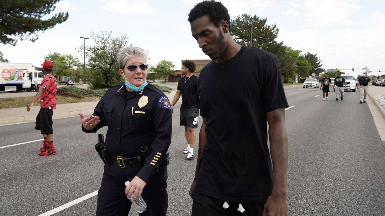 Police chief defends pepper spray at Elijah McClain vigil