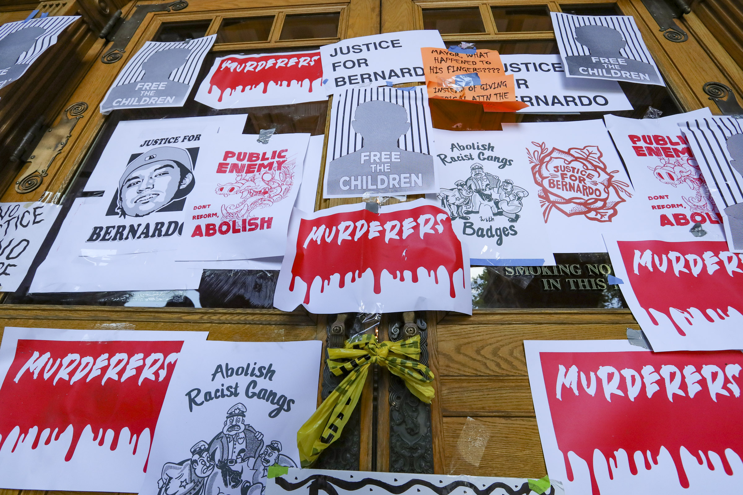 Signs placed on the Salt Lake City-County Building during the latest protest decrying the death of Bernardo Palacios-Carbajal, who was shot and killed by police in May, are pictured on Thursday, July 2, 2020. The protest was cut short after the police made an arrest. (Steve Griffin, KSL)