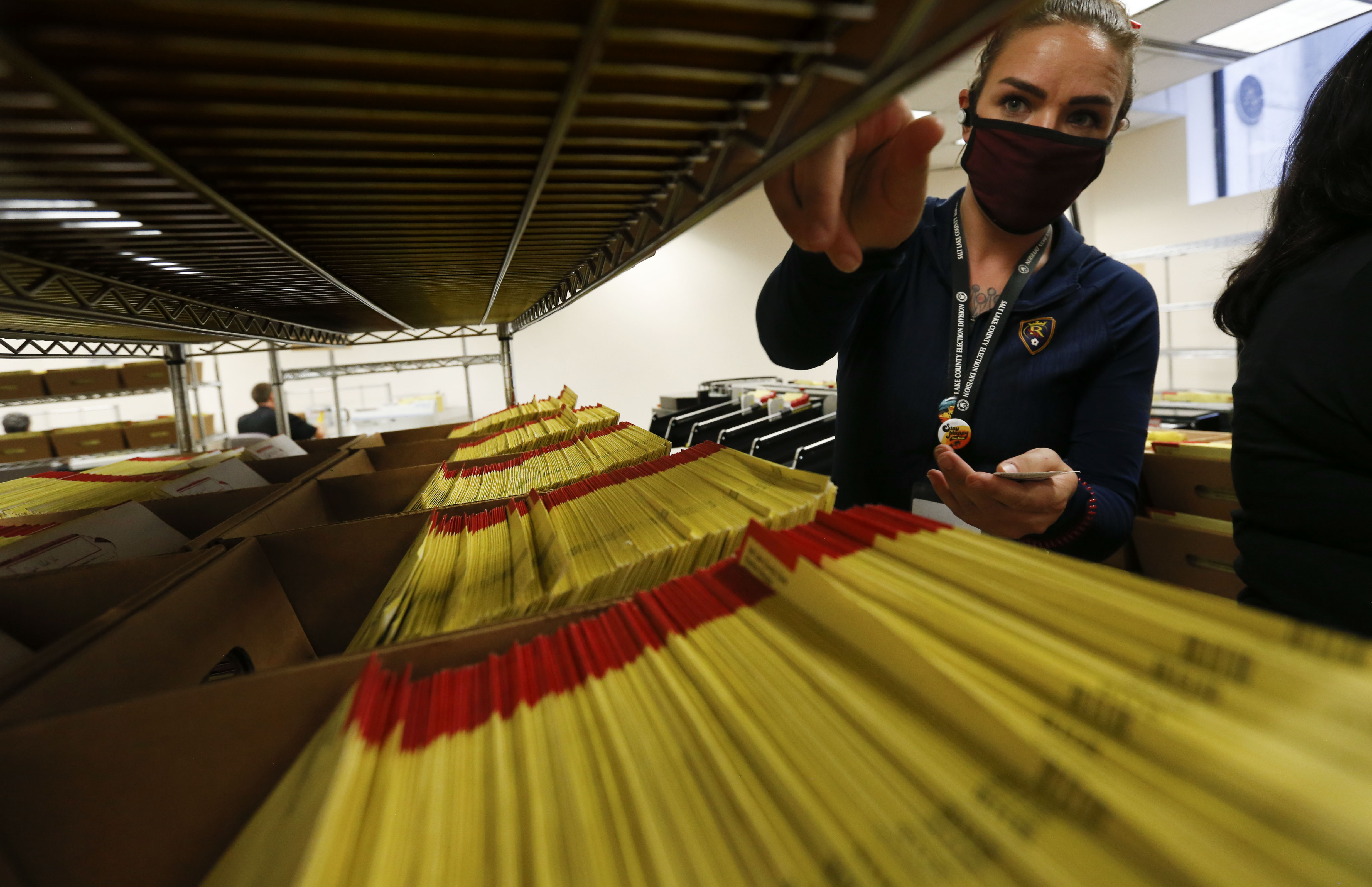 Demitri Doyle organizes primary ballots at the Salt Lake County Government Center in Salt Lake City on Thursday, July 2, 2020. Votes are still being tallied, but Utah’s GOP gubernatorial primary race is now down to two candidates — Lt. Gov. Spencer Cox and former Gov. Jon Huntsman Jr. (Laura Seitz, KSL)