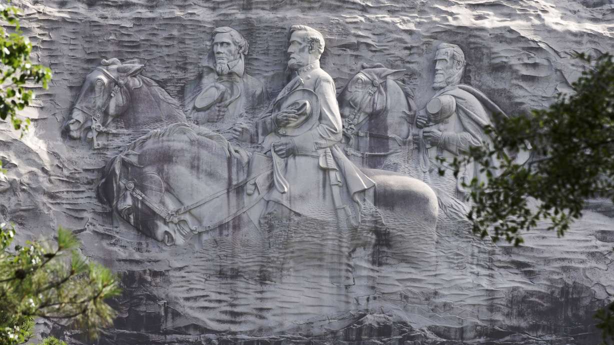As monuments fall, Confederate carving has size on its side