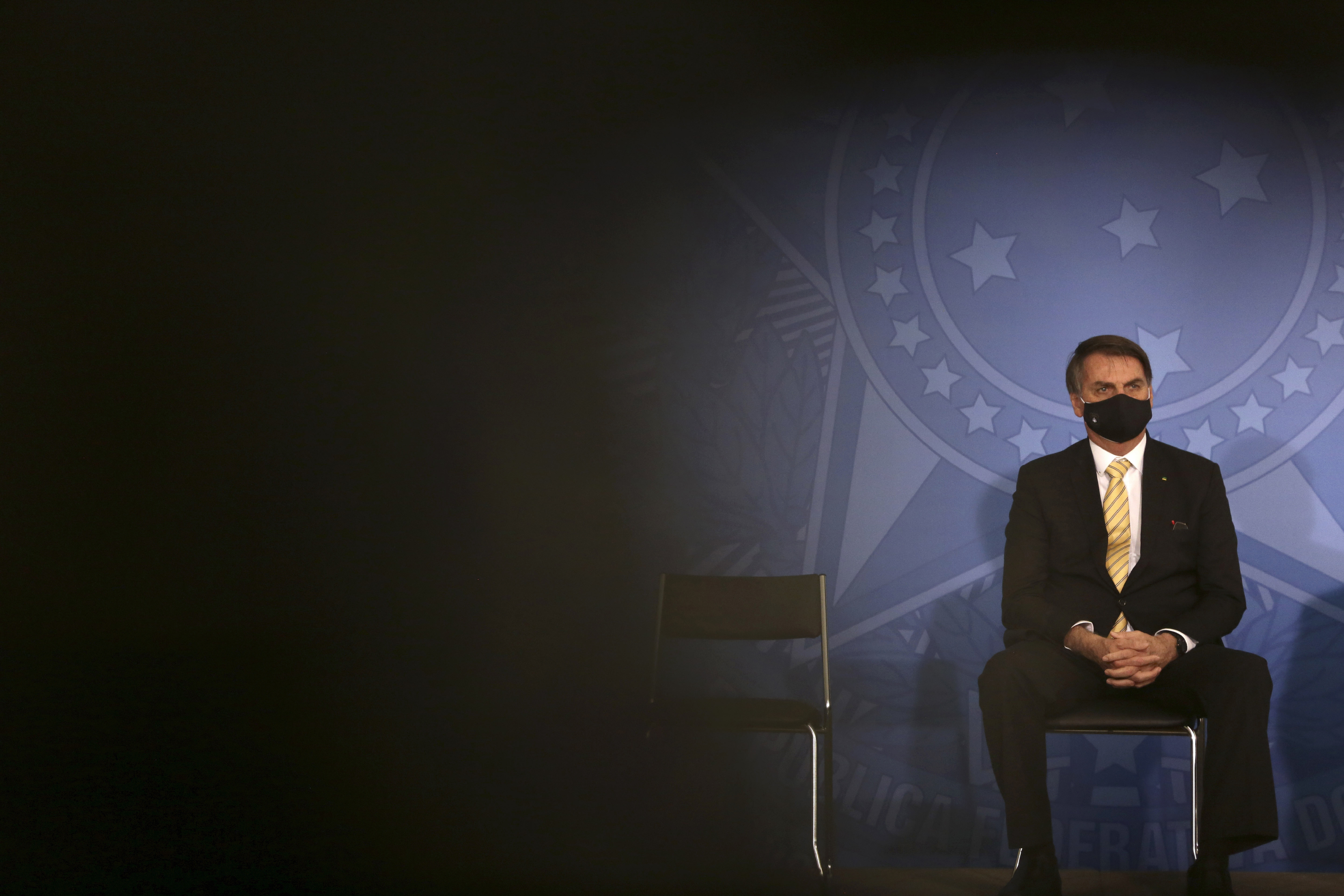 AP Explains: Bolsonaro has downplayed virus fears for months