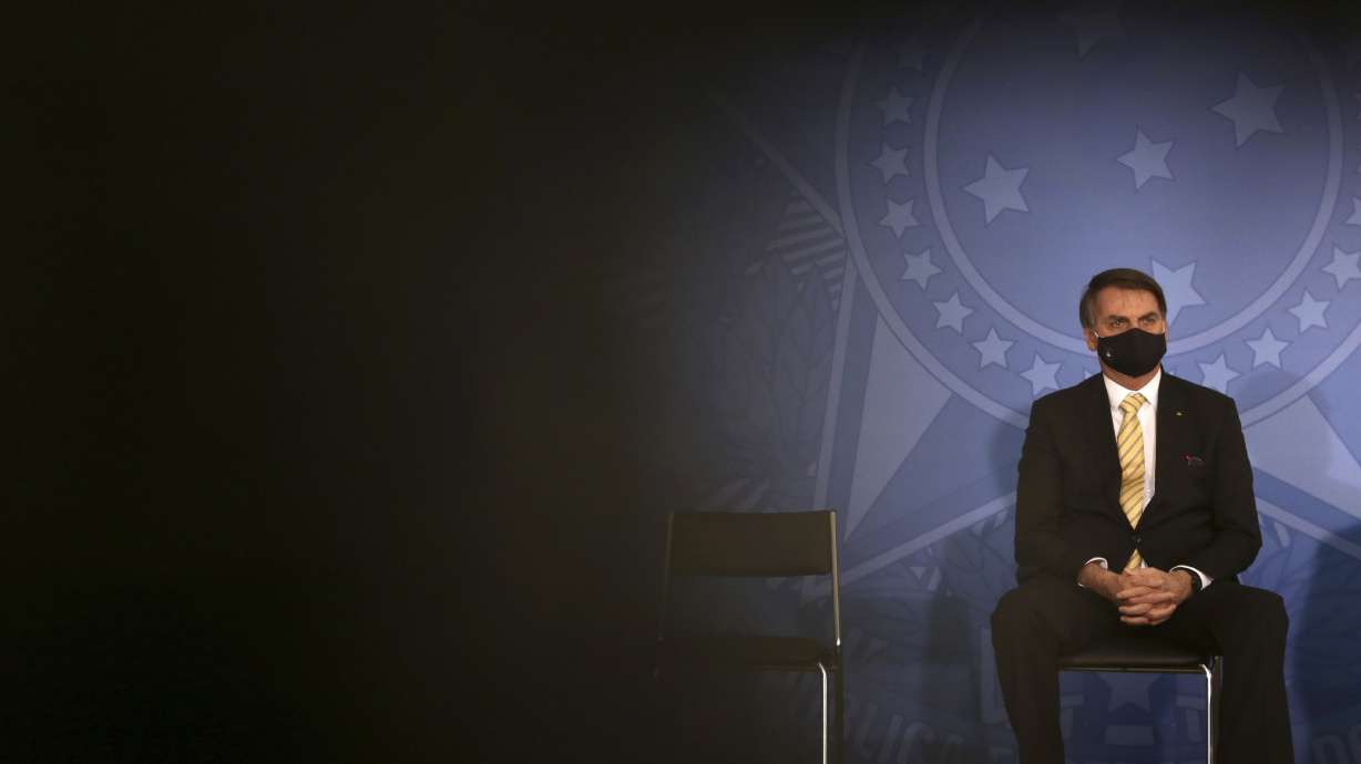 AP Explains: Bolsonaro has downplayed virus fears for months