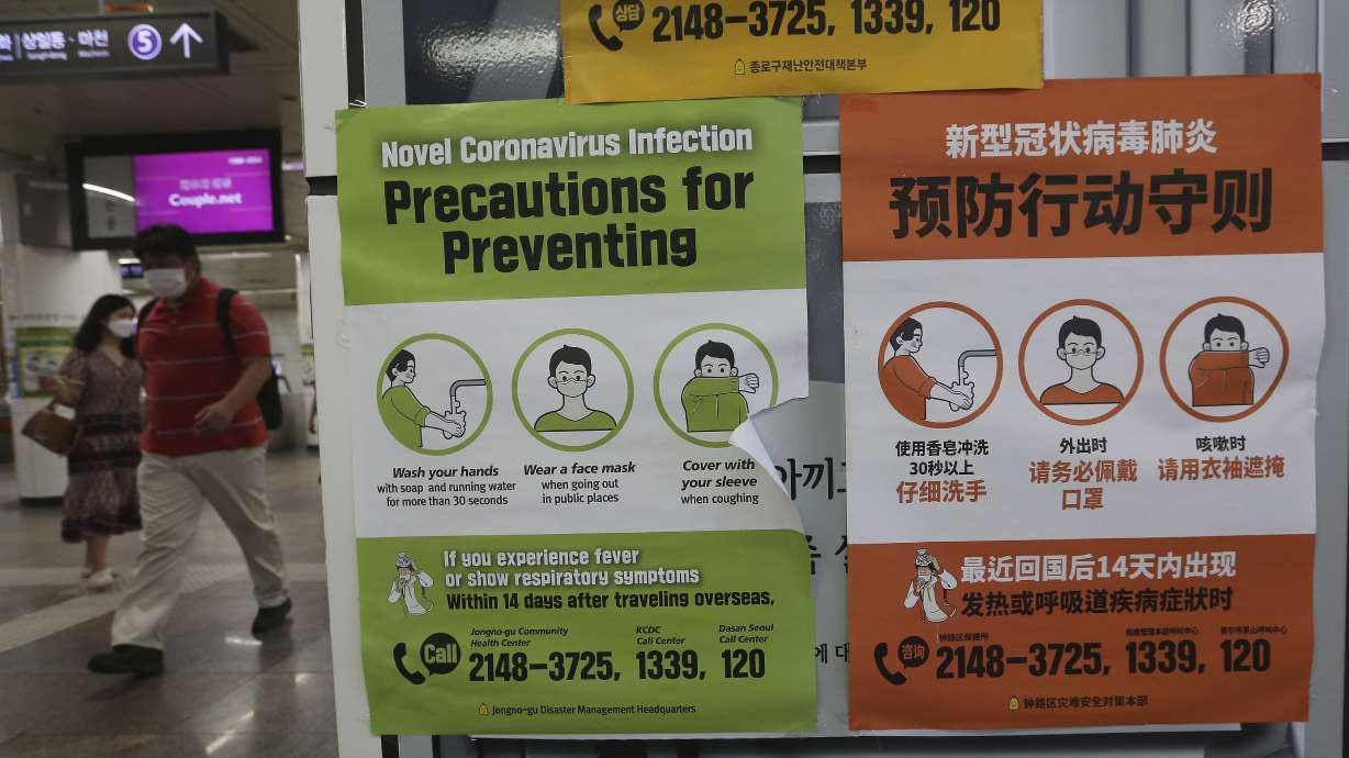 The Latest: China easing into reopening as local cases wane