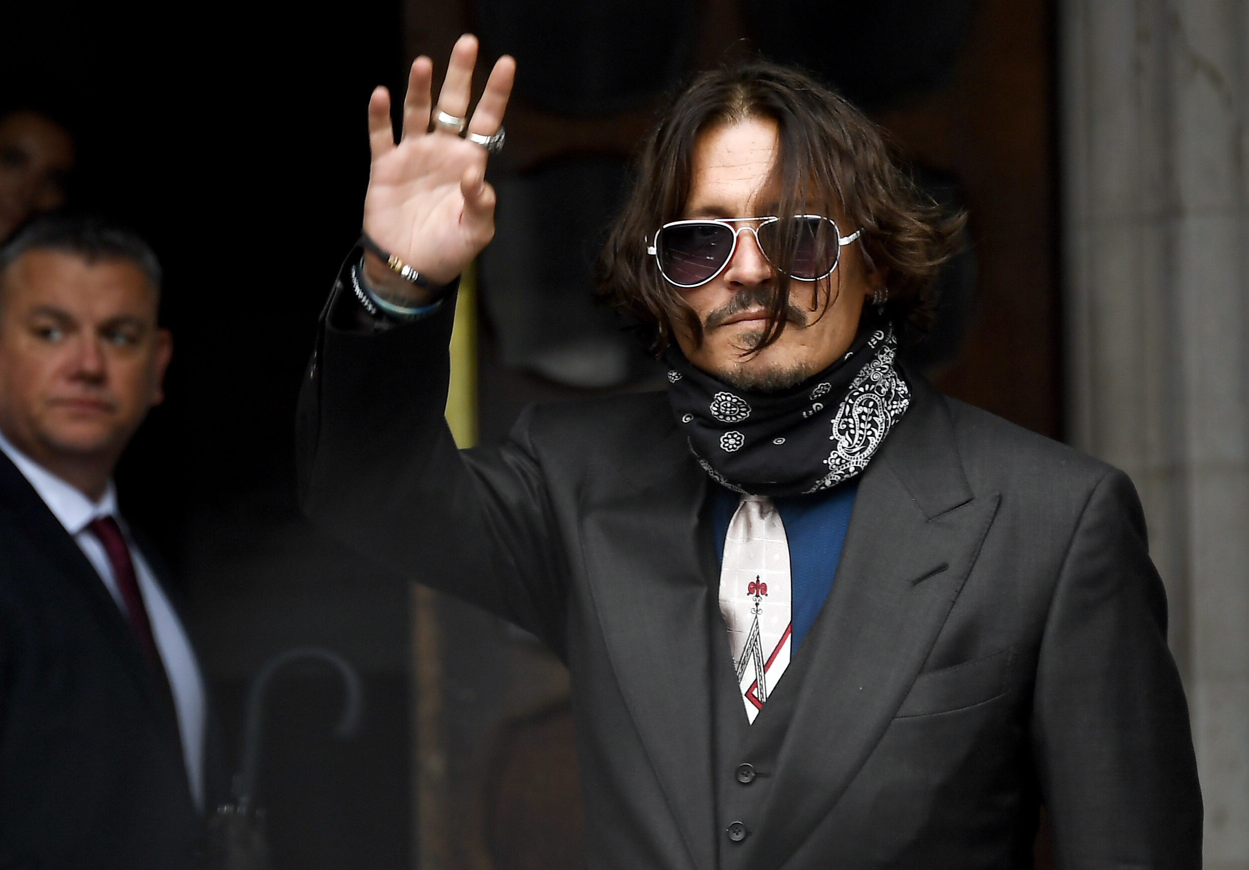 In UK libel case, Depp denies hitting ex-wife Amber Heard