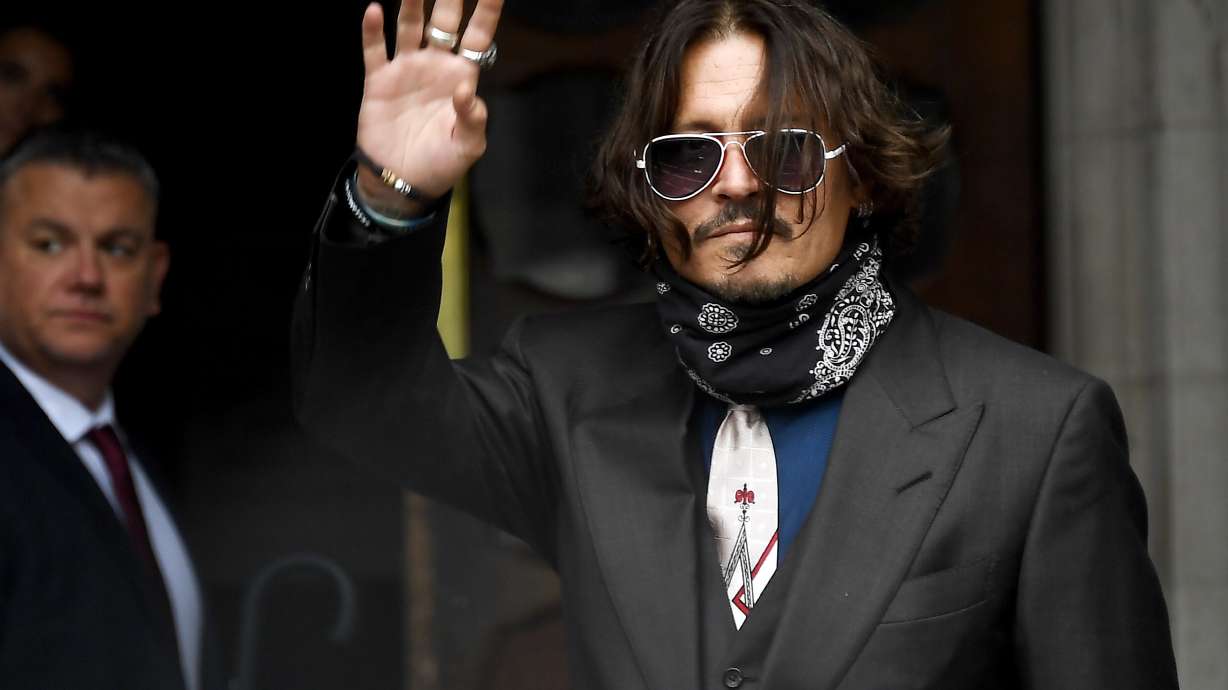 In UK libel case, Depp denies hitting ex-wife Amber Heard