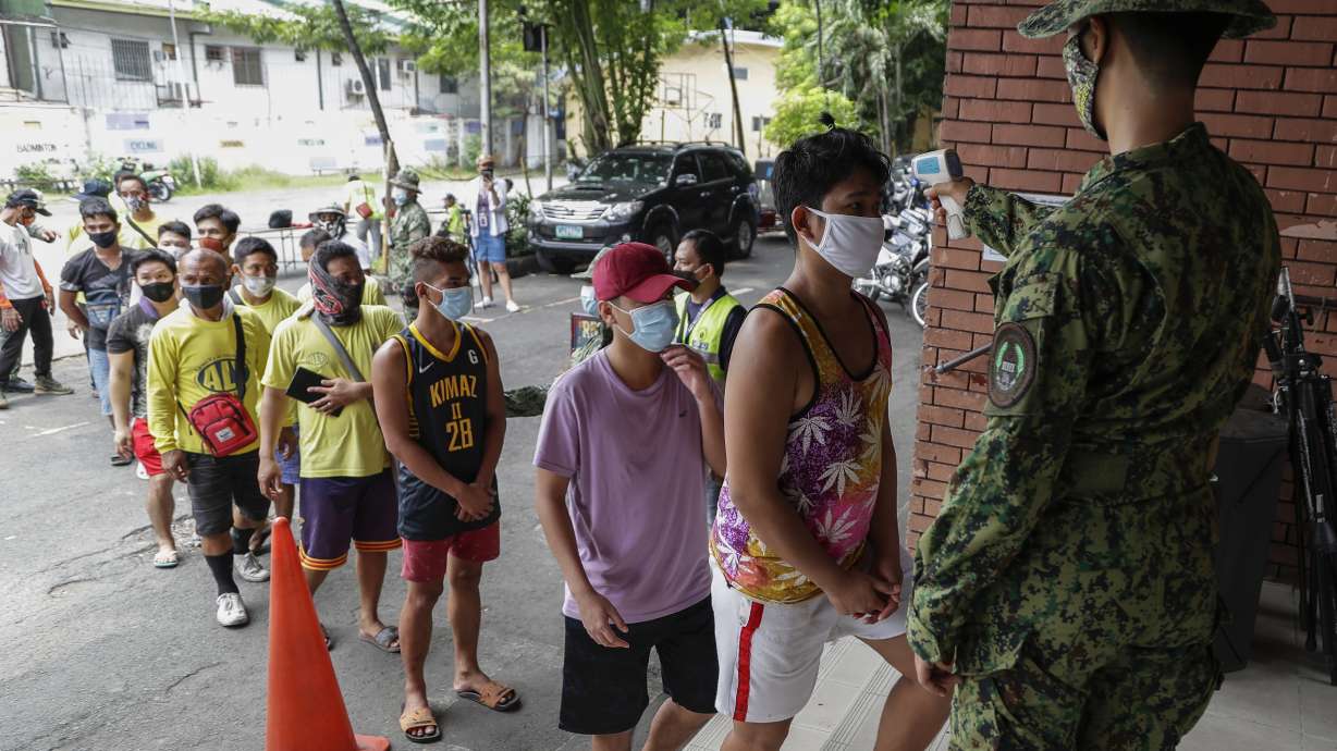 Philippines virus cases soar past 50,000 as lockdown eases