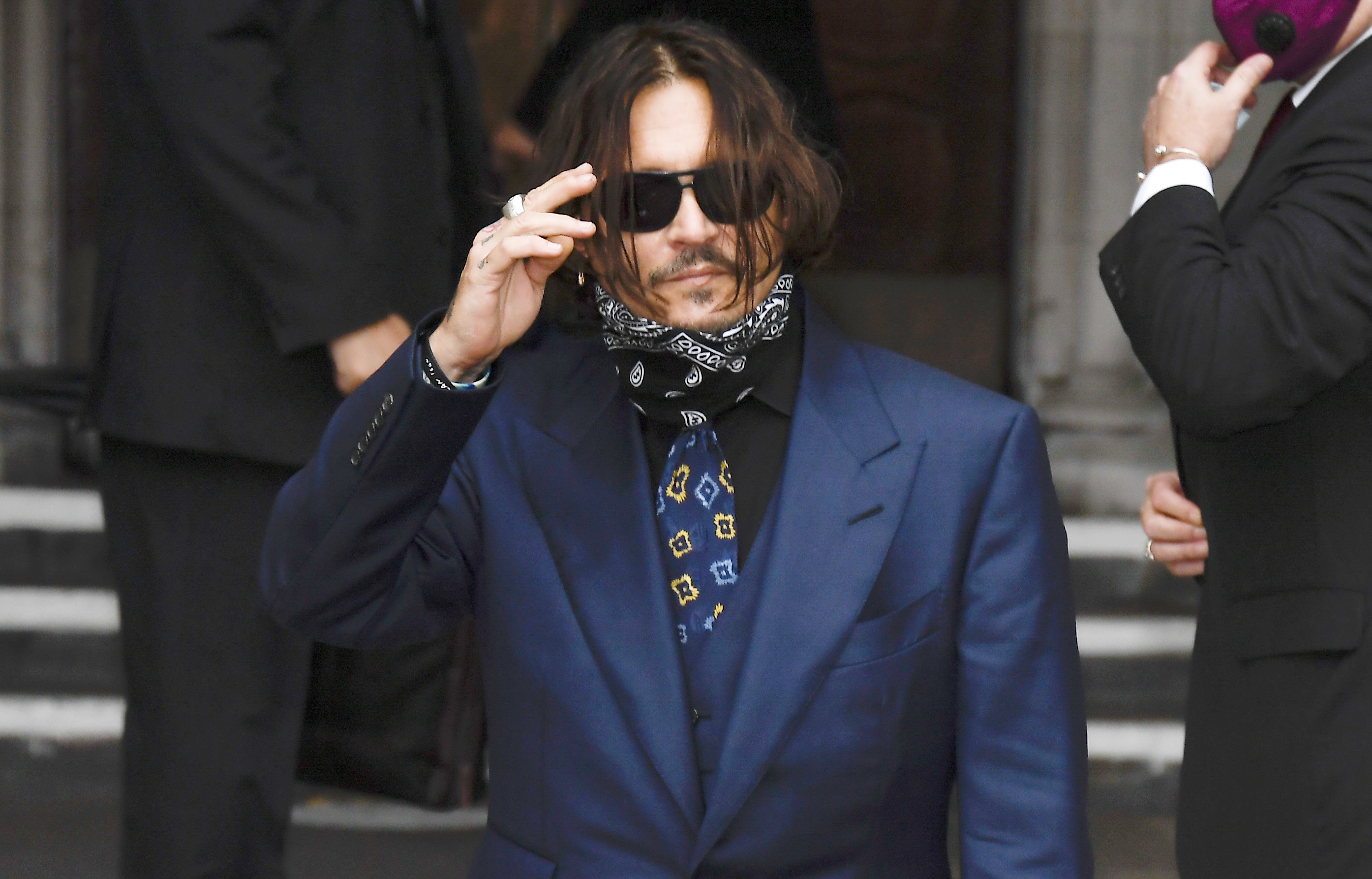 In court, Depp denies violence during 'tailspin' marriage 