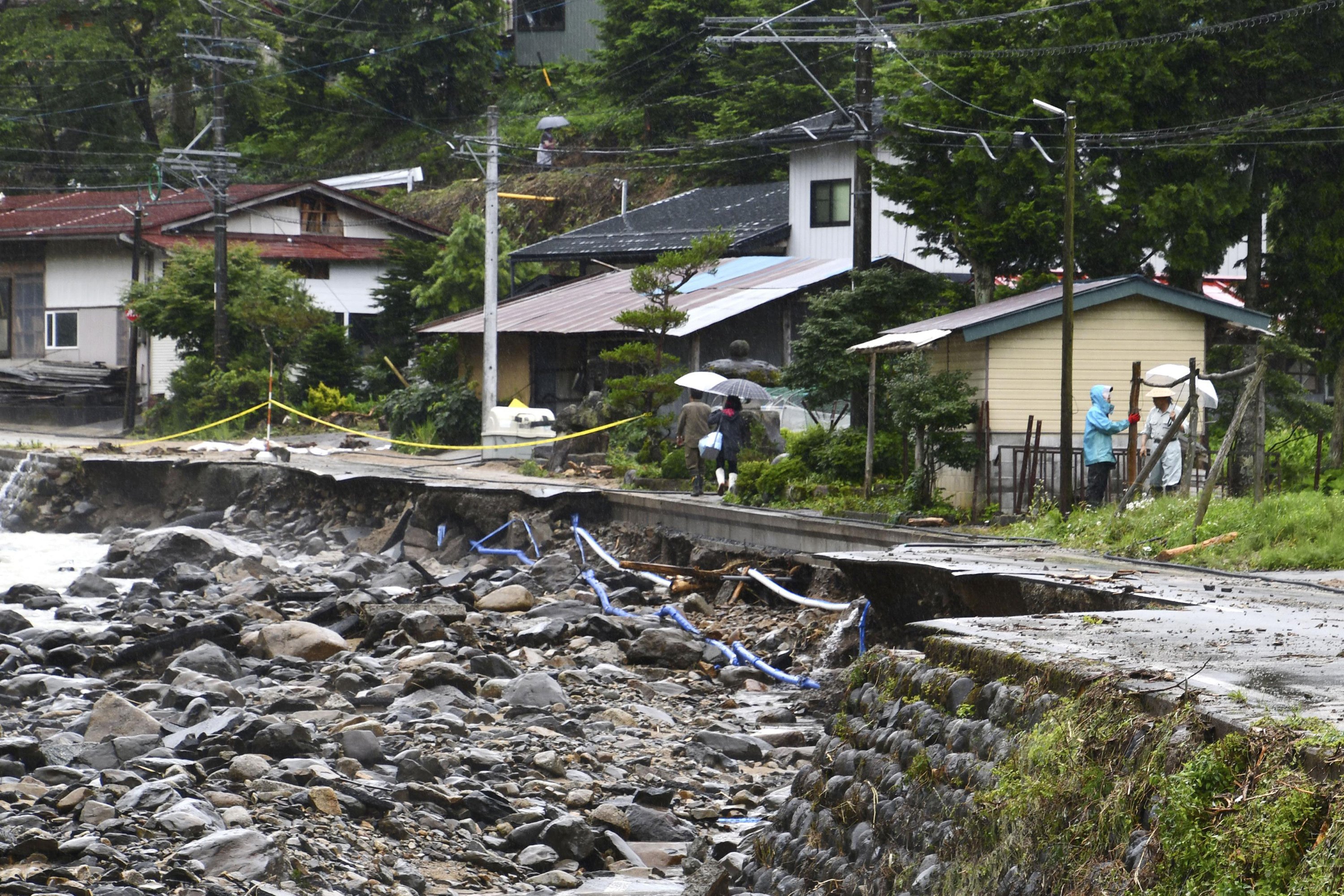 Japan braces for more heavy rain as death toll rises to 66