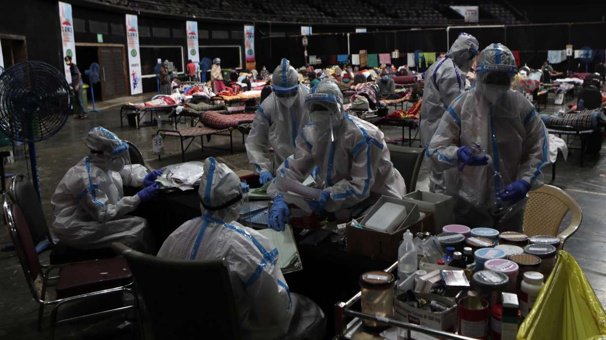 AP Explains: Why India cases are rising to multiple peaks