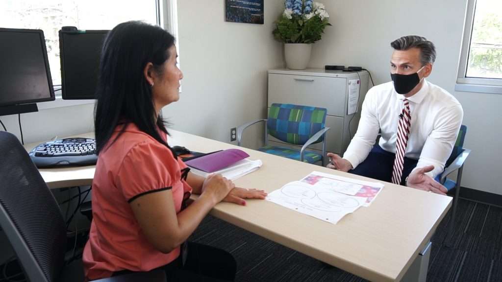 Tair Kiphibane, infectious disease bureau manager for Salt Lake County Health Department, speaks with KSL's Mike Headrick. (Photo: KSL TV)