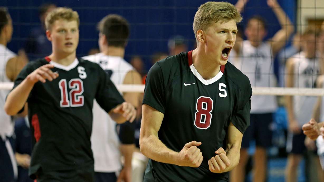 Stanford's James Shaw celebrates as the 11th ranked Stanford Cardinal defeats the top ranked BYU men's volleyball Cougars 3-2 games Friday, Jan. 15, 2016, in Provo.