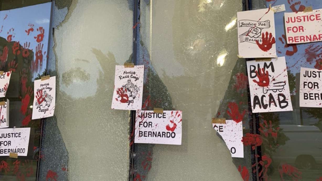 Windows that were smashed by protesters at the Salt Lake County District Attorney’s Office building are pictured on Thursday, July 9, 2020.