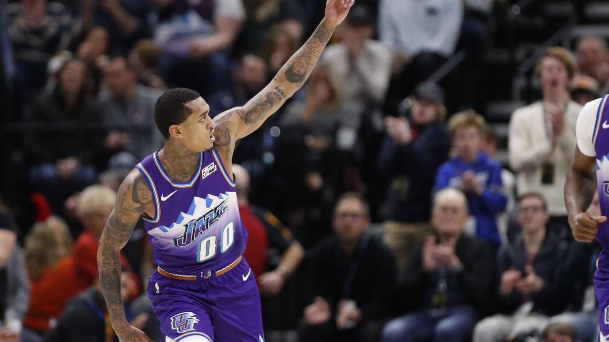 Utah Jazz guard Jordan Clarkson (00) reacts after a basket against the Portland Trail Blazers during the second quarter in an NBA basketball game Thursday, Dec. 26, 2019, in Salt Lake City. (AP Photo/Jeff Swinger)