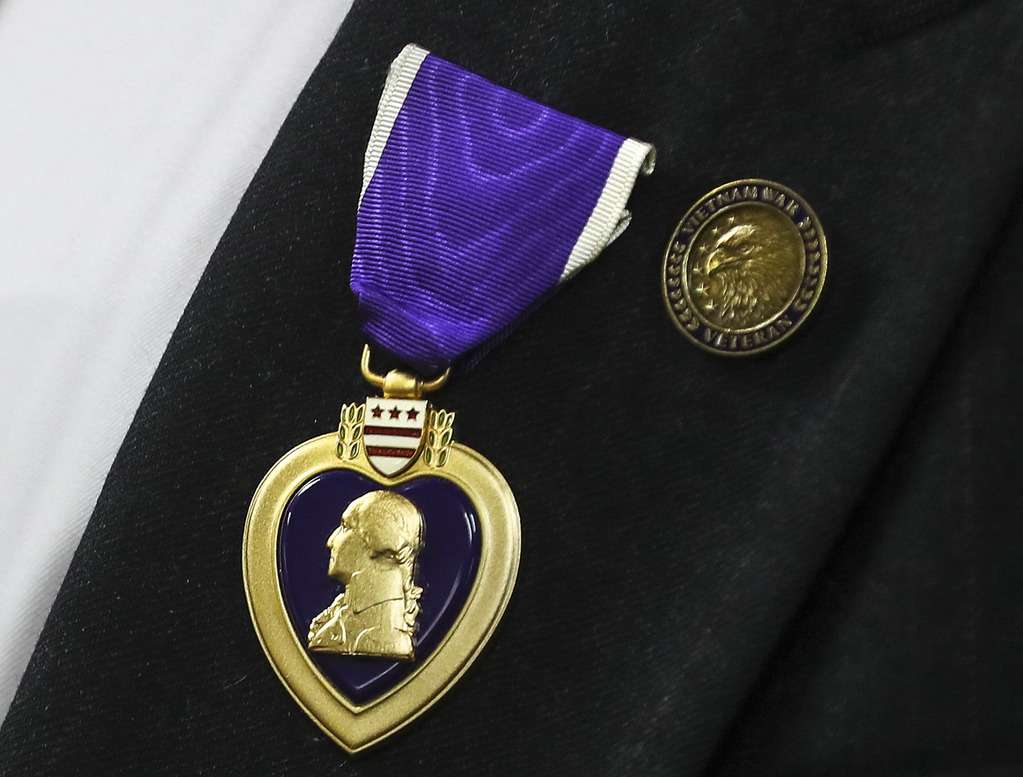 Douglas W. Evans wears his Purple Heart that was presented to him by Utah Rep. Ben McAdams, D-Utah, at McAdams' office in West Jordan on Monday, July 13, 2020. Evans received the award for wounds suffered during the Vietnam War. McAdams’ staff worked with the Department of Defense on behalf of the Evans family to untangle a paperwork issue that for 50 years prevented the medal citation from being included in his official Army record.