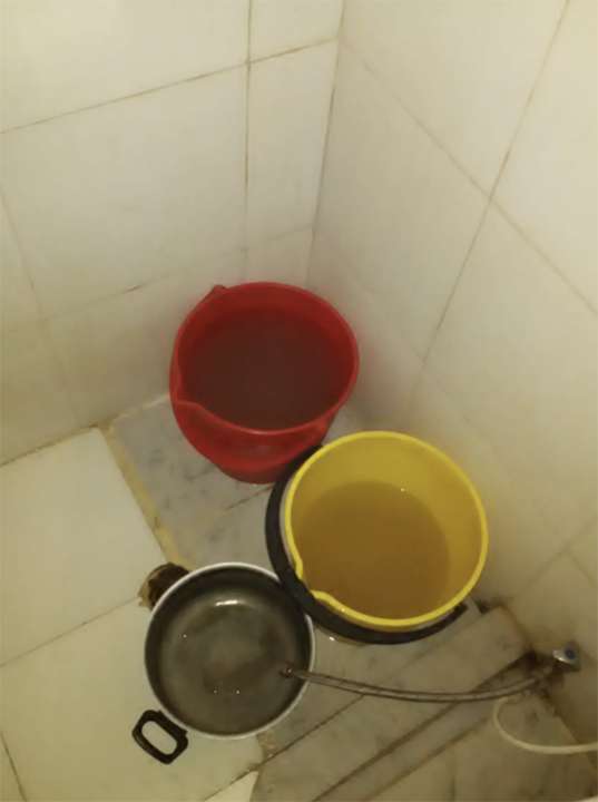 Once he was moved to a cell that had running water, Josh Holt collected it in buckets like this so he and his cellmates could use it to bathe and drink. Frequently, it was filled with brown sediment. Josh Holt