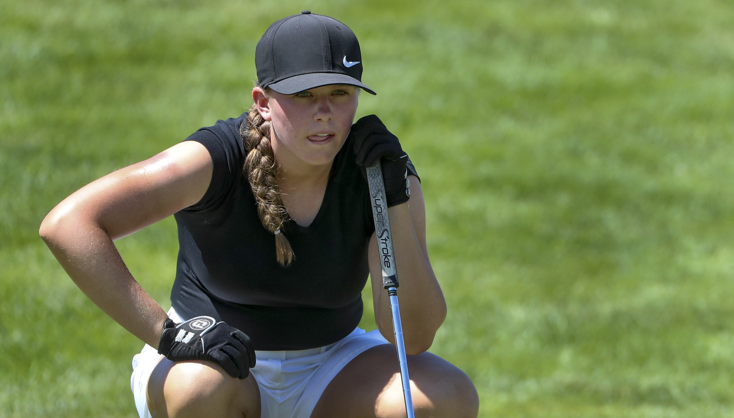 Grace Summerhays studies her putt as she plays Sunbin Seo during the Utah Women's State Am at the Soldier Hollow Golf Course in Midway on Wednesday, July 15, 2020.