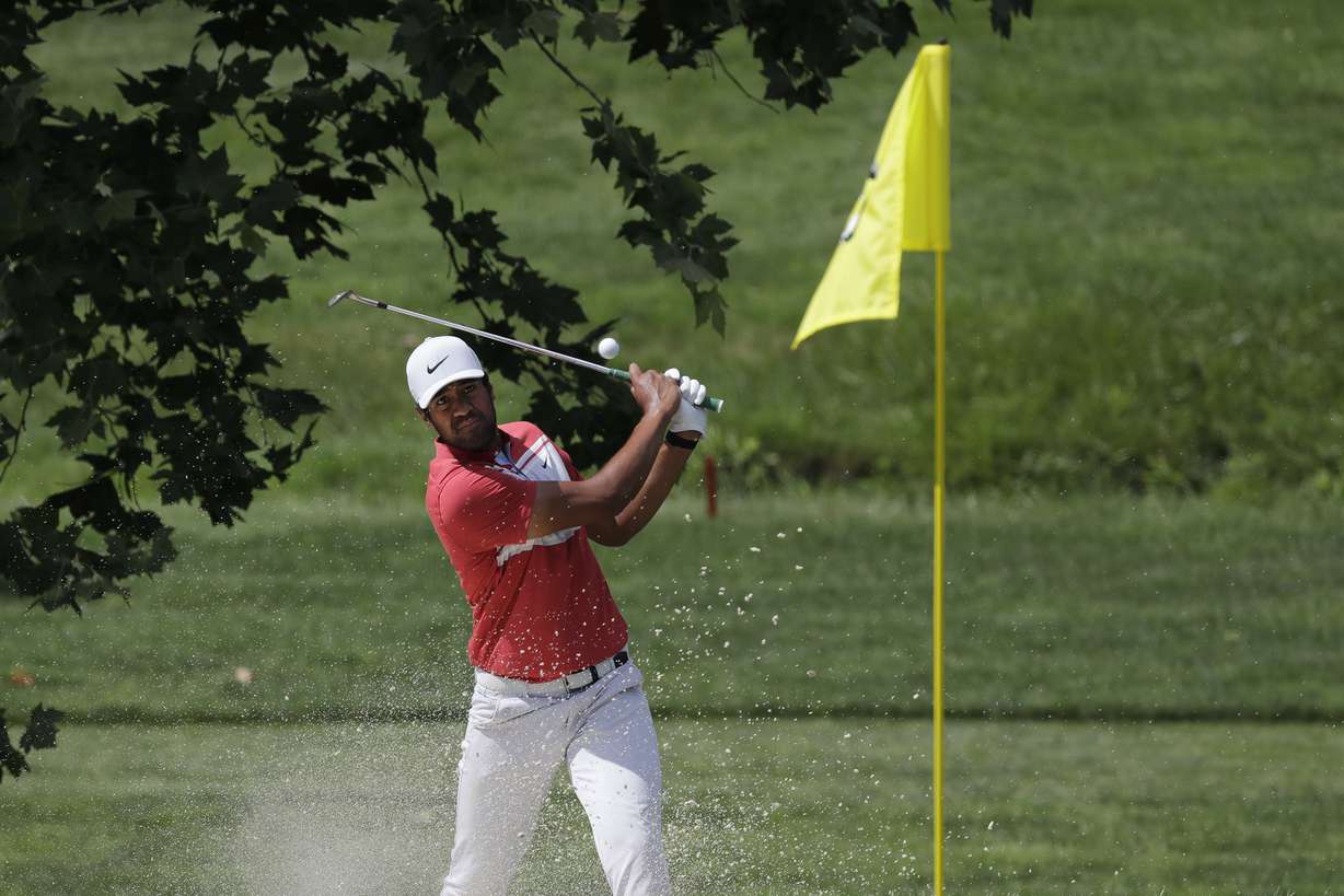 Tony Finau hits from a bunker toward the fourth green during the second round of the Memorial golf tournament, Friday, July 17, 2020, in Dublin, Ohio. (Photo: Darron Cummings, AP)