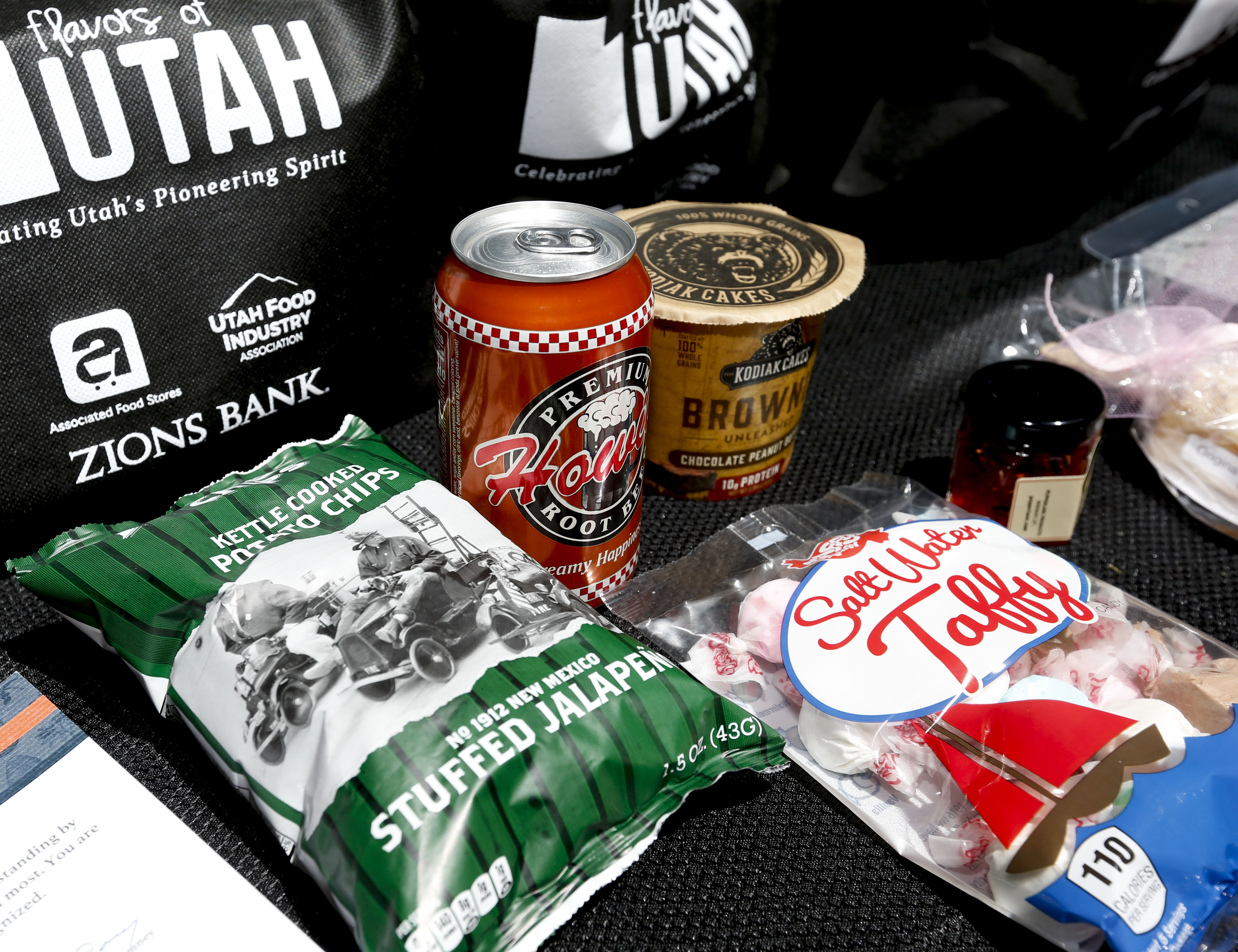 Utah-produced food items are displayed at the fifth annual Flavors of Utah event at LDS Hospital in Salt Lake City on Friday, July 17, 2020. The event to promote Utah's food industry is normally held in Washington, D.C., but due to COVID-19, a safe distribution of Utah foods was not possible in the nation’s capital. Instead, the same producers who would have sent their food products to Washington are now donating them to first responders at hospitals throughout the state.