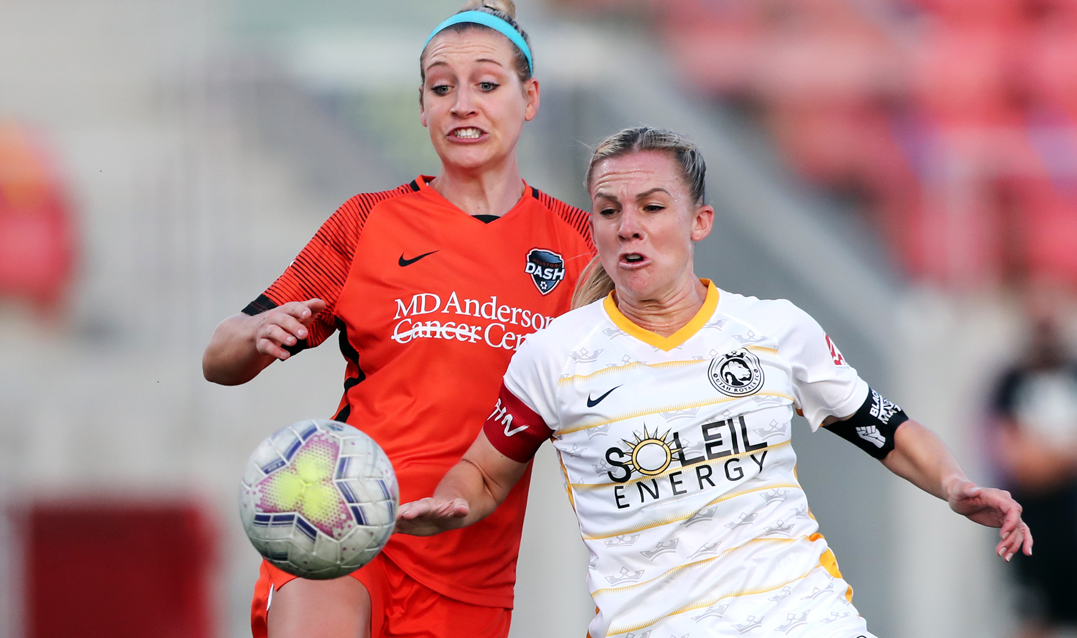 Houston Dash defender Erin Simon (17) tries to keep Utah Royals FC forward Amy Rodriguez (8) from getting around to the ball as the Utah Royals and the Houston Dash play in the Challenge Cup quarterfinals at Zions Bank Stadium in Herriman Utah on Friday, July 17, 2020.