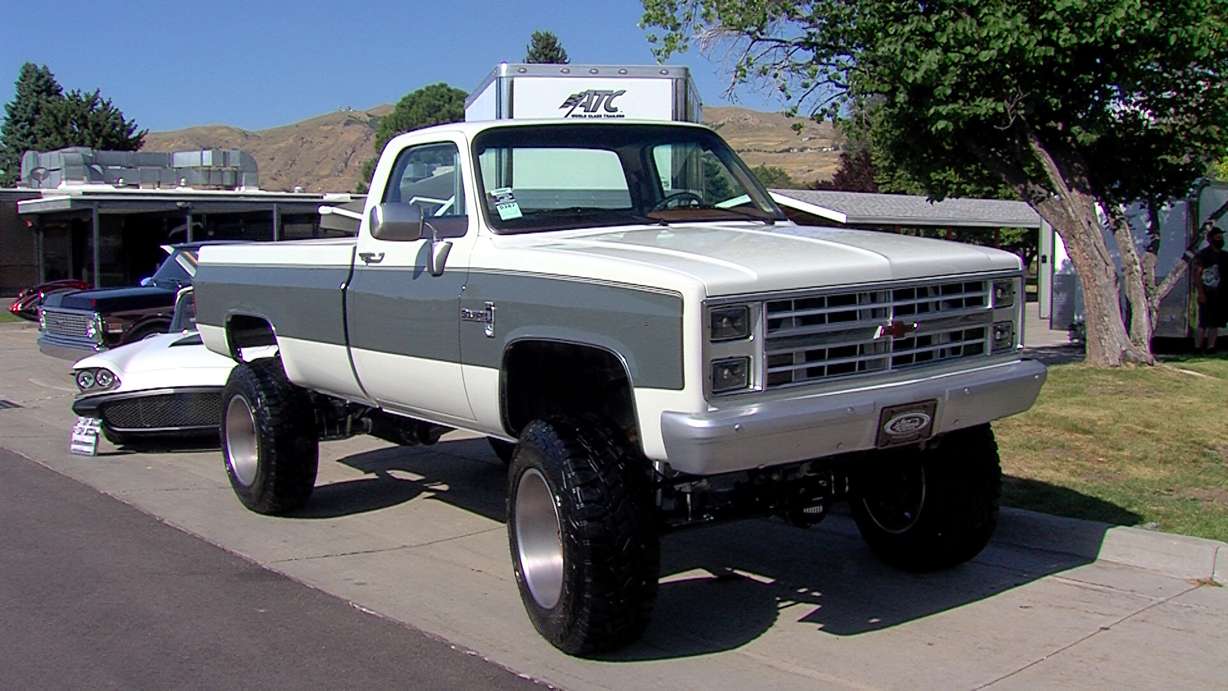 "SquareD," a 1980 Chevrolet pickup with a Duramax/Cummins drive train, soaks up the sun at the Good Guys show.
