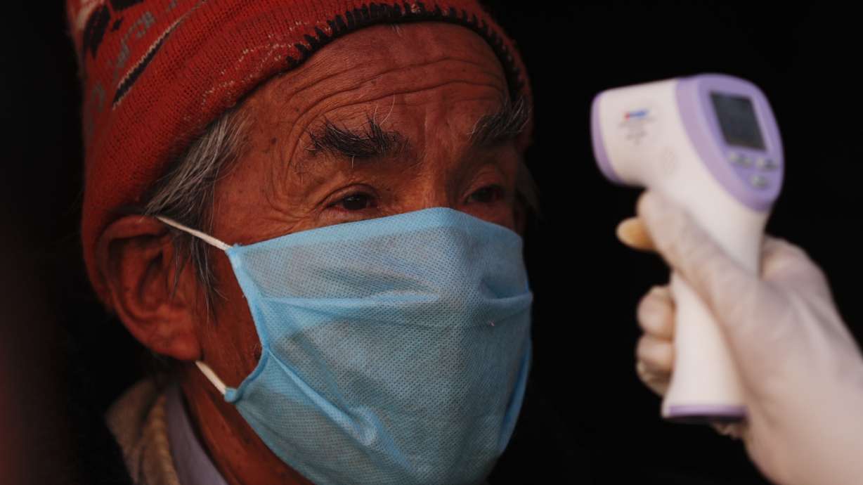 The Latest: S. Korea has smallest rise in cases in 2 months