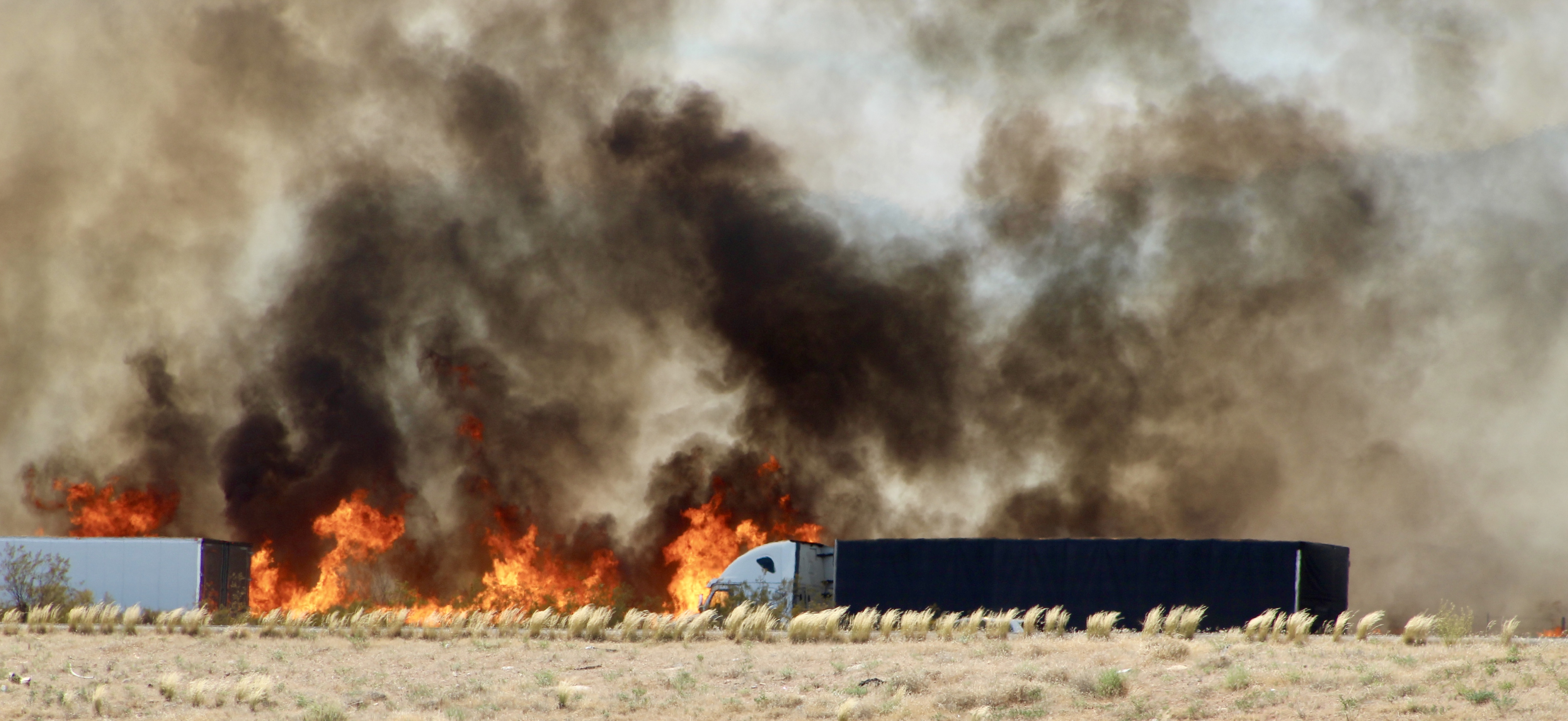 The Cottonwood Trail Fire burns near I-15 in Washington County on Sunday, July 19, 2020.
